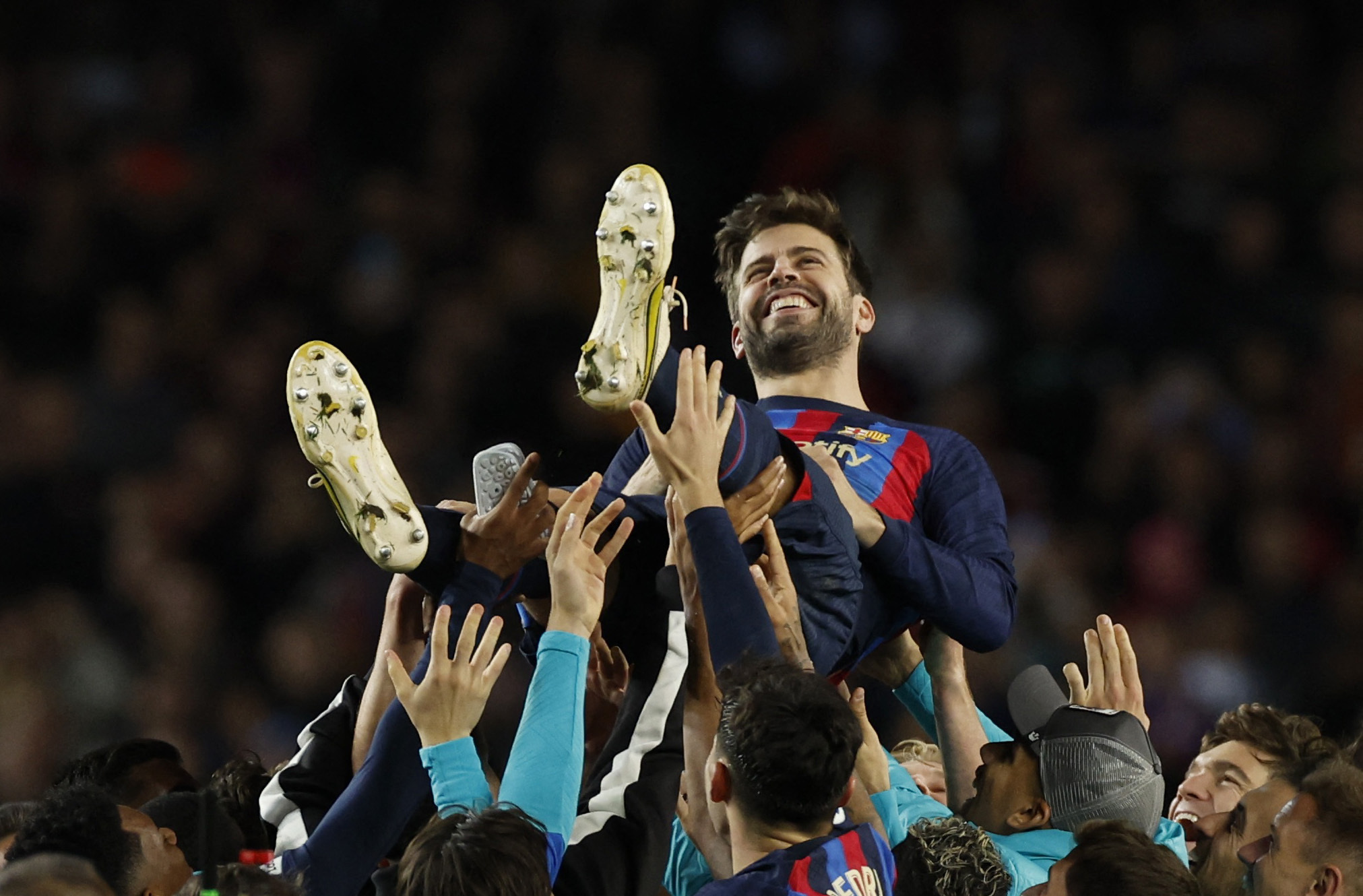 Soccer Football - LaLiga - FC Barcelona v Almeria - Camp Nou, Barcelona, Spain - November 5, 2022 FC Barcelona's Gerard Pique celebrates with teammates after playing his last home game for FC Barcelona REUTERS