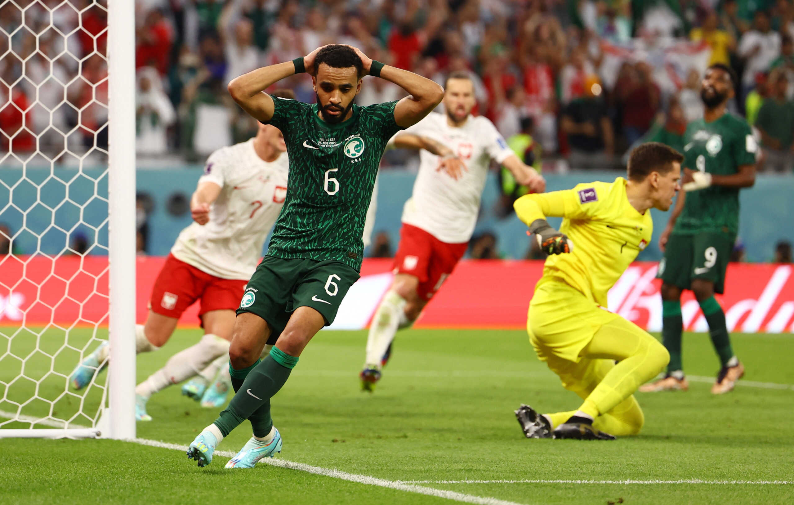 Soccer Football - FIFA World Cup Qatar 2022 - Group C - Poland v Saudi Arabia - Education City Stadium, Al Rayyan, Qatar - November 26, 2022 Saudi Arabia's Mohammed Al Burayk reacts after his shot is saved by Poland's Wojciech Szczesny REUTERS