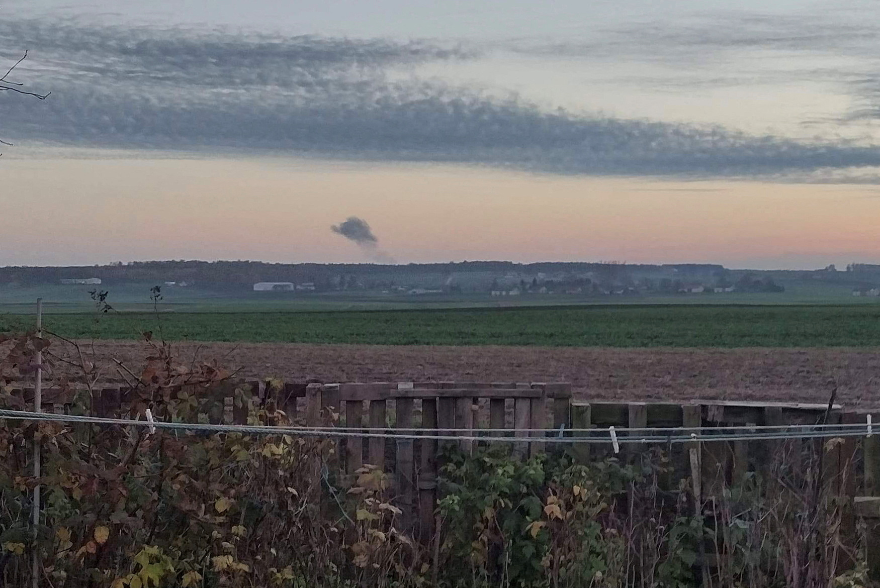 Smoke rises in the distance, amid reports of two explosions, seen from Nowosiolki, Poland, near the border with Ukraine November 15, 2022 in this image obtained from social media. Stowarzyszenie Moje Nowosiolki via REUTERS  THIS IMAGE HAS BEEN SUPPLIED BY A THIRD PARTY. MANDATORY CREDIT. THIS IMAGE WAS PROCESSED BY REUTERS TO ENHANCE QUALITY, AN UNPROCESSED VERSION HAS BEEN PROVIDED SEPARATELY.