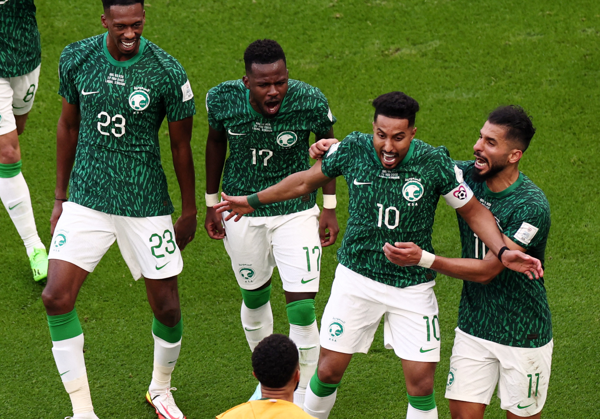 Soccer Football - FIFA World Cup Qatar 2022 - Group C - Argentina v Saudi Arabia - Lusail Stadium, Lusail, Qatar - November 22, 2022  Saudi Arabia's Salem Al-Dawsari celebrates scoring their second goal with teammates REUTERS