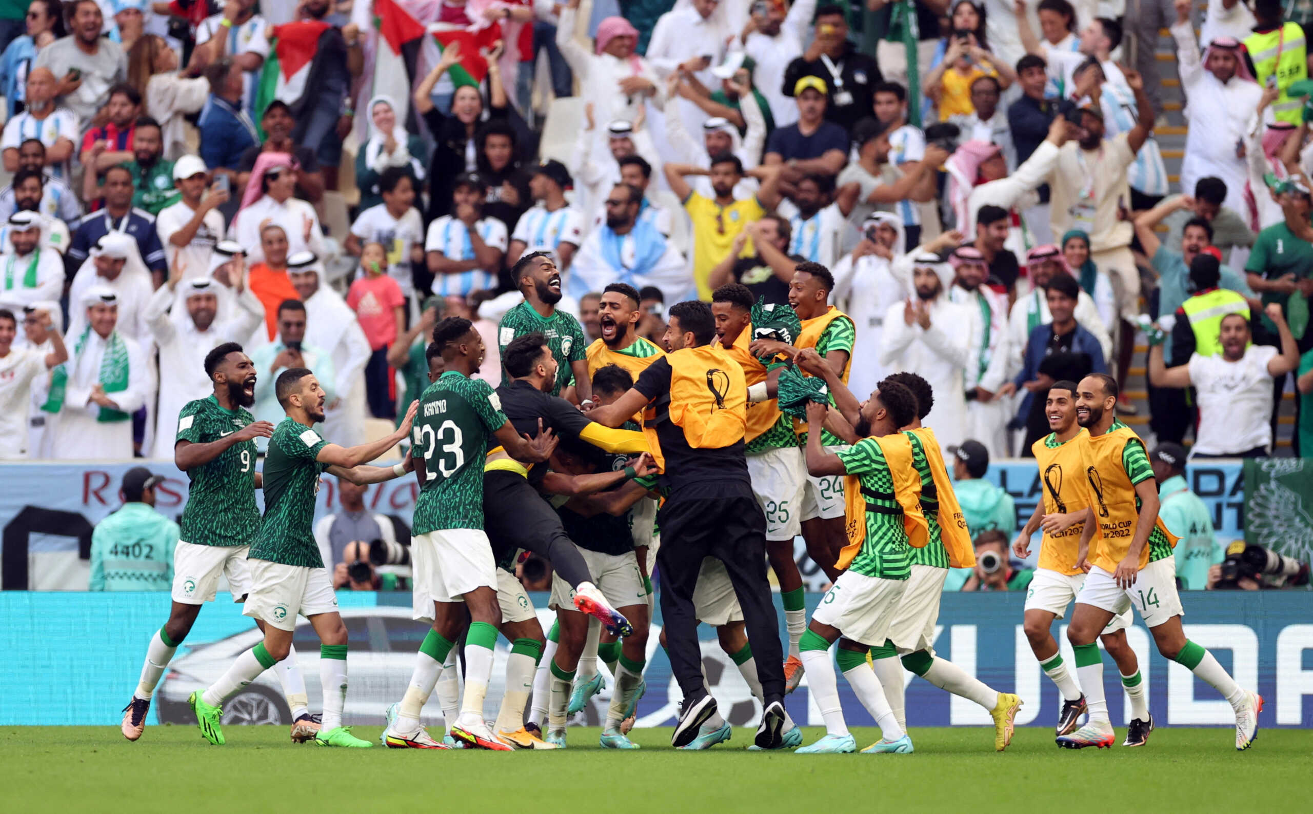 Soccer Football - FIFA World Cup Qatar 2022 - Group C - Argentina v Saudi Arabia - Lusail Stadium, Lusail, Qatar - November 22, 2022 Saudi Arabia's Salem Al-Dawsari celebrates scoring their second goal with teammates REUTERS