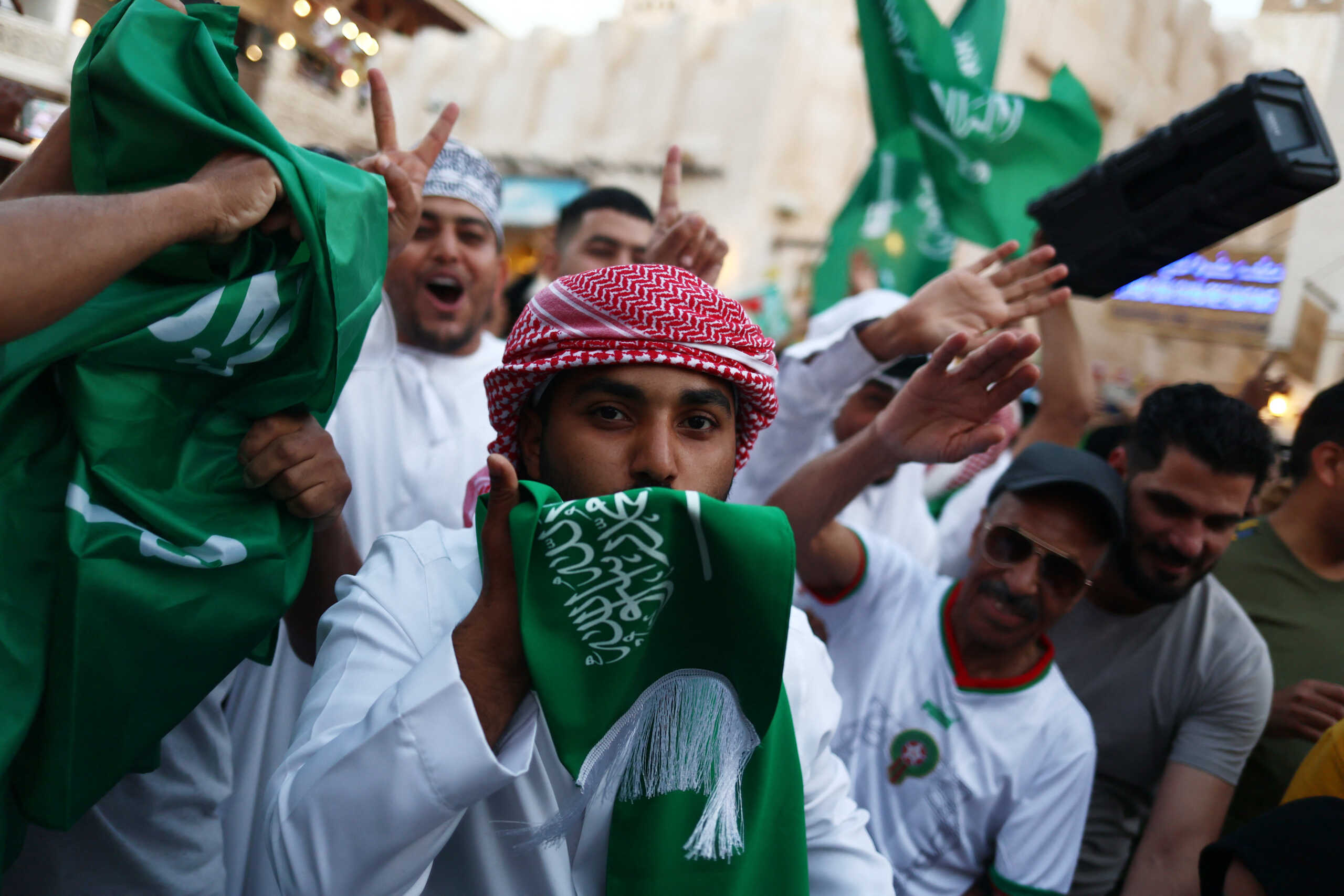 Soccer Football - FIFA World Cup Qatar 2022 - Doha, Qatar - November 22, 2022 Saudi Arabia fans celebrate in Souq Waqif after the match between Saudia Arabia and Argentina REUTERS