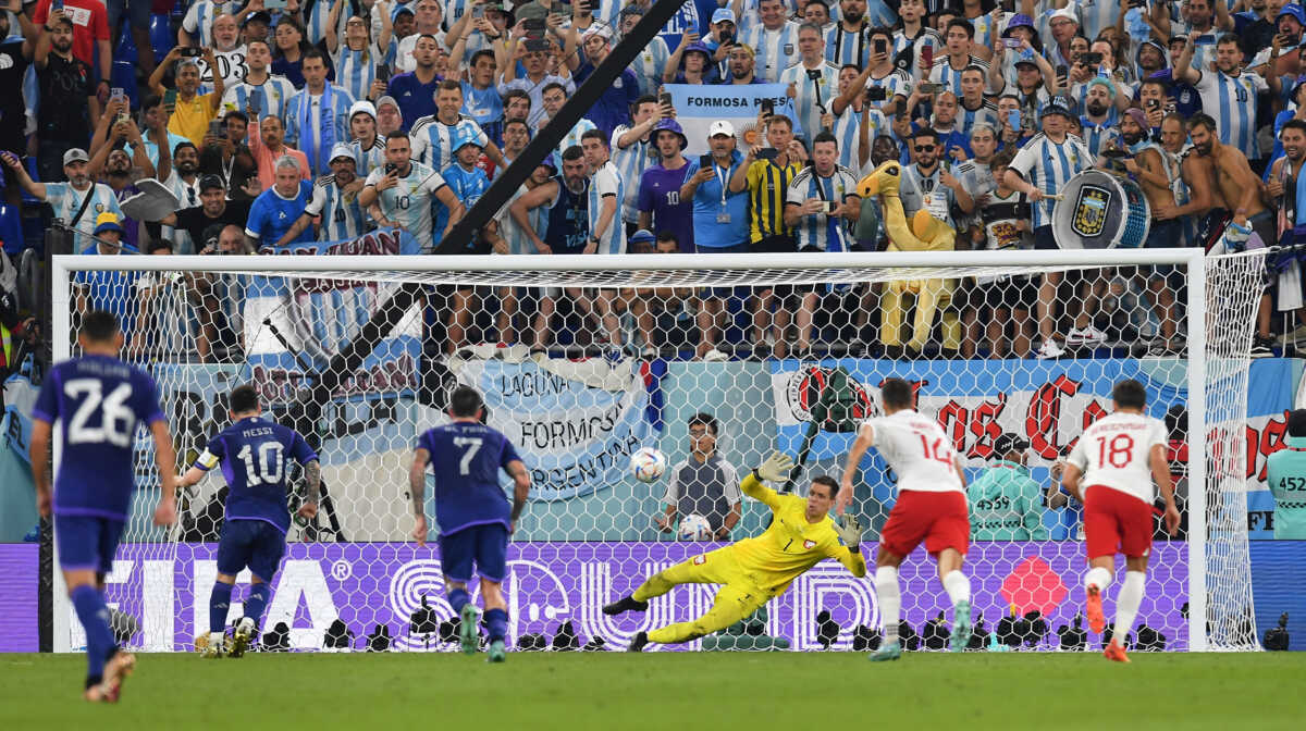 Soccer Football - FIFA World Cup Qatar 2022 - Group C - Poland v Argentina - Stadium 974, Doha, Qatar - November 30, 2022 Poland's Wojciech Szczesny saves a penalty from Argentina's Lionel Messi REUTERS