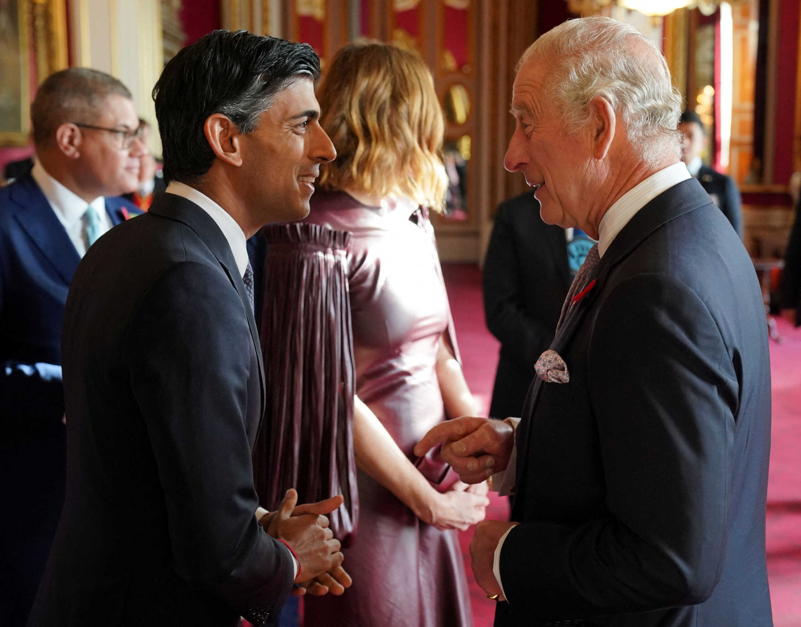 King Charles III speaks with Prime Minister Rishi Sunak, during a reception at Buckingham Palace, London, ahead of the Cop27 Summit.  November 4, 2022. Jonathan Brady