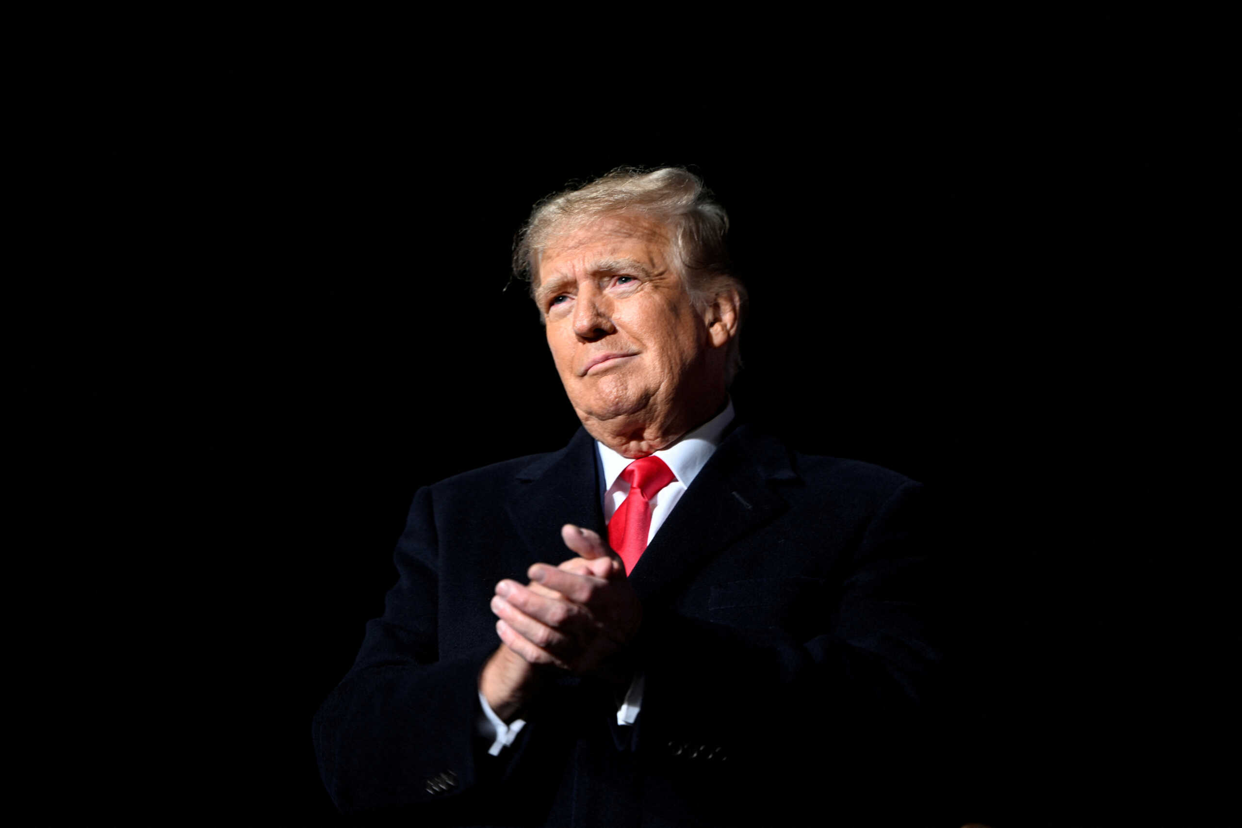 FILE PHOTO: Former U.S. President Donald Trump attends a rally to support Republican candidates ahead of midterm elections, in Dayton, Ohio, U.S. November 7, 2022.  REUTERS