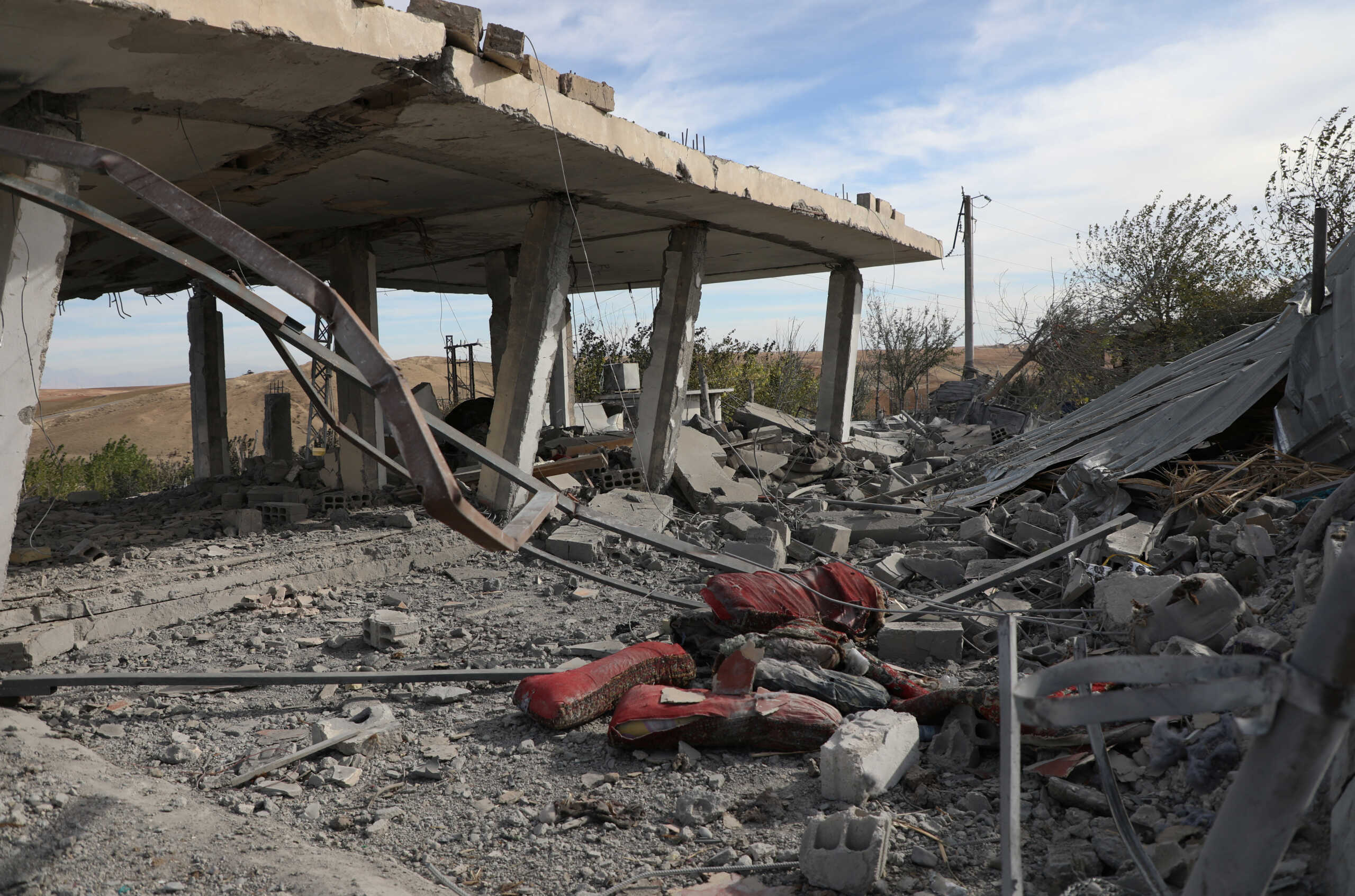 A view shows the aftermath after Turkish warplanes carried out air strikes, in Derik countryside, Syria November 21, 2022. REUTERS