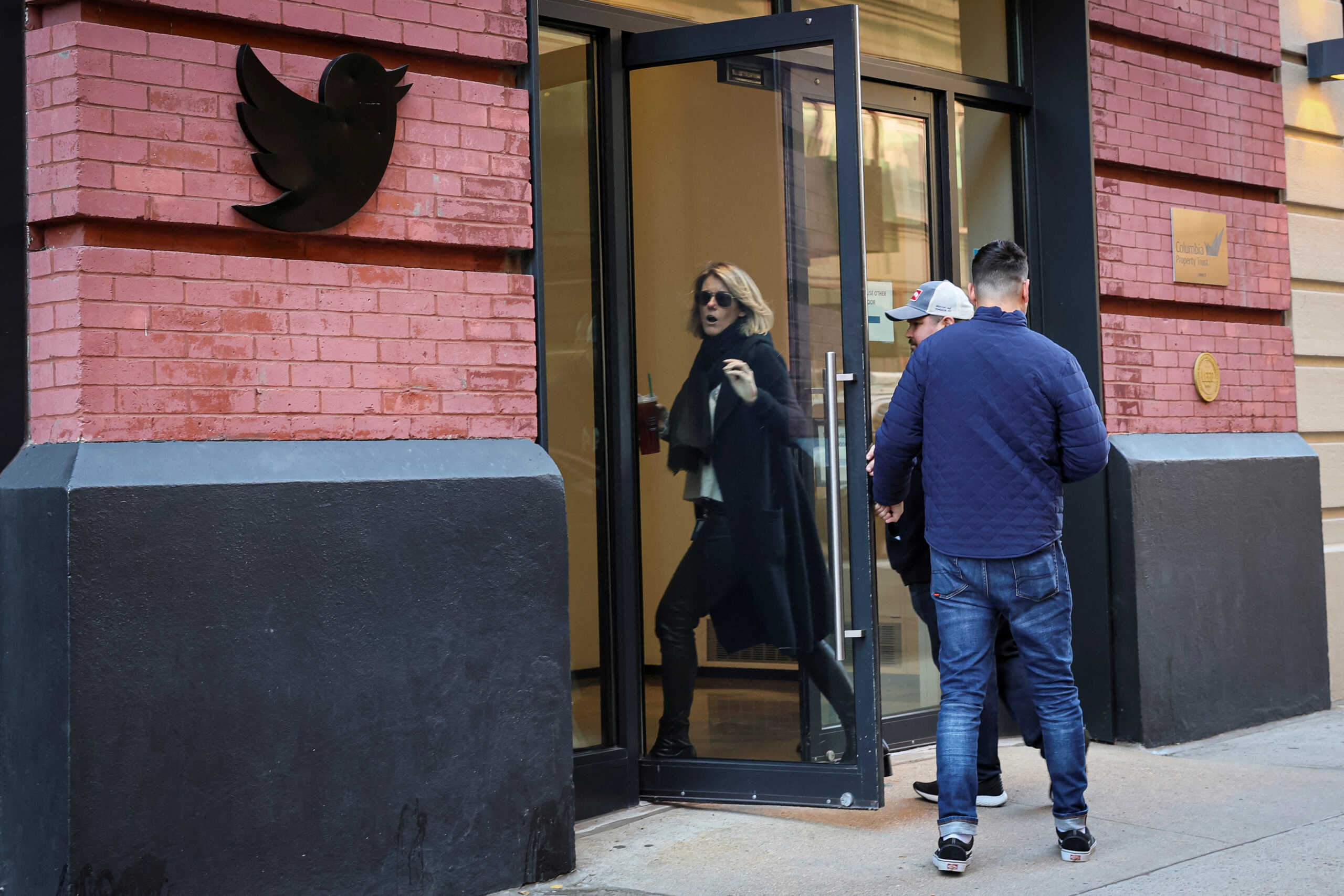 Twitter employees are seen entering the offices in New York City, U.S., November 9, 2022. REUTERS