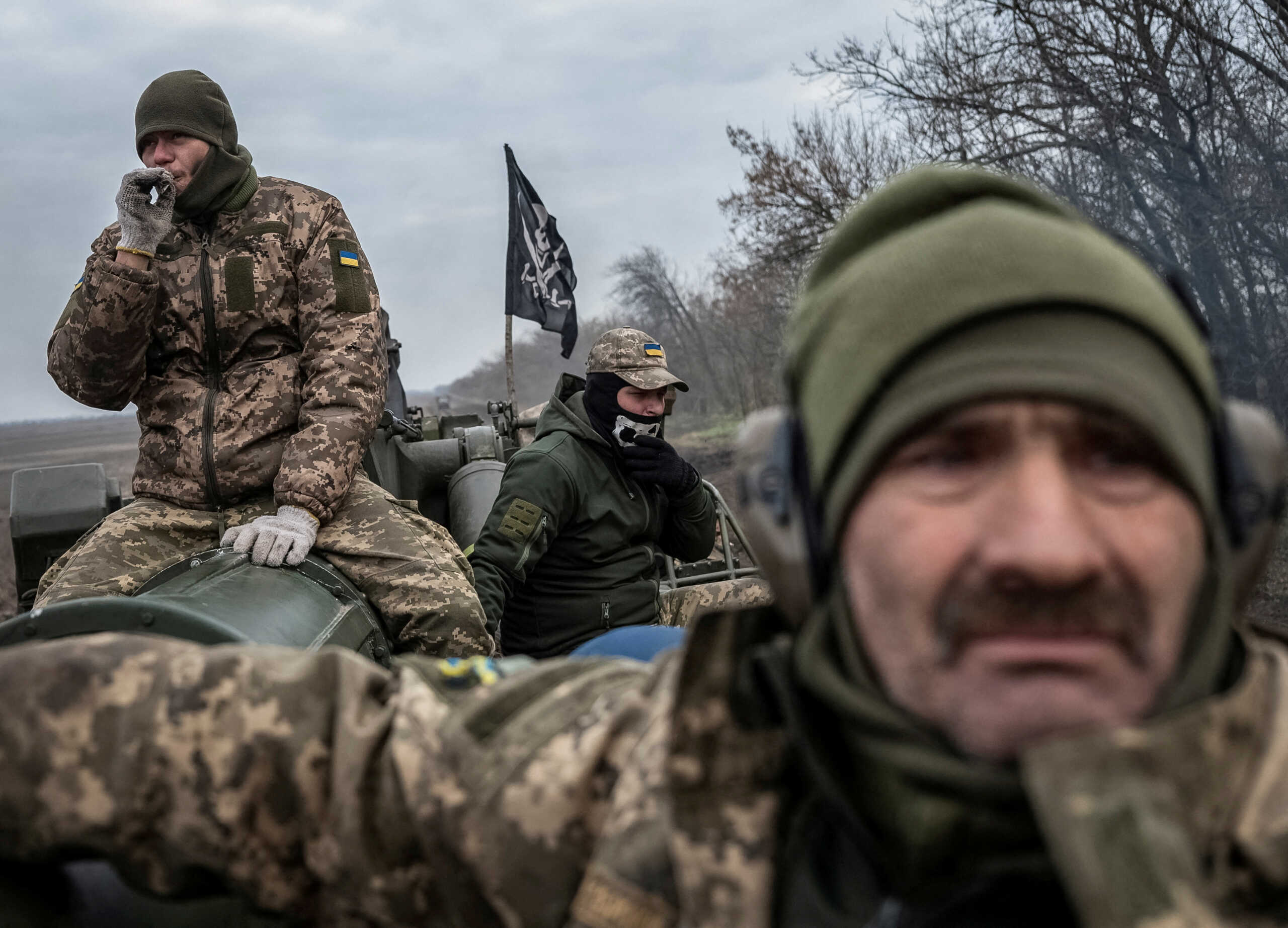 Ukrainian servicemen ride a 2S7 Pion self-propelled gun, as Russia's attack on Ukraine continues, near a frontline in Kherson region, Ukraine November 9, 2022. REUTERS