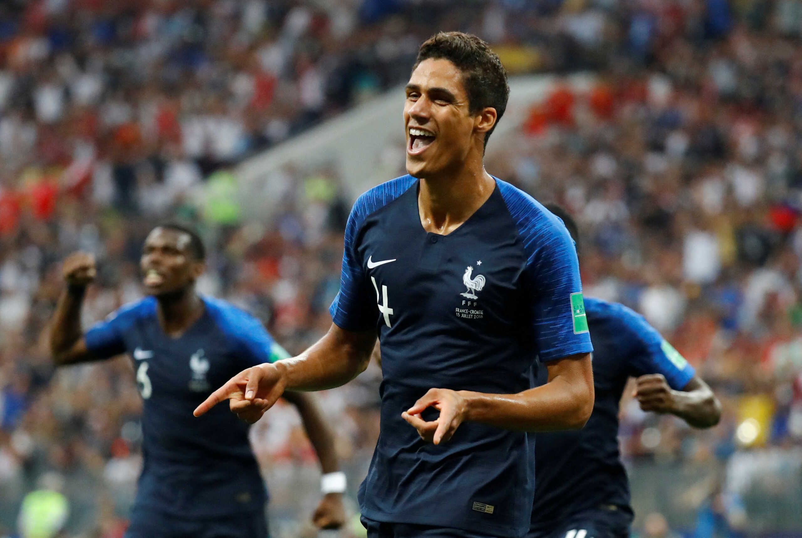 FILE PHOTO: Soccer Football - World Cup - Final - France v Croatia - Luzhniki Stadium, Moscow, Russia - July 15, 2018  France's Raphael Varane celebrates after Croatia's Mario Mandzukic (not pictured) scored an own goal and the first goal for France  REUTERS