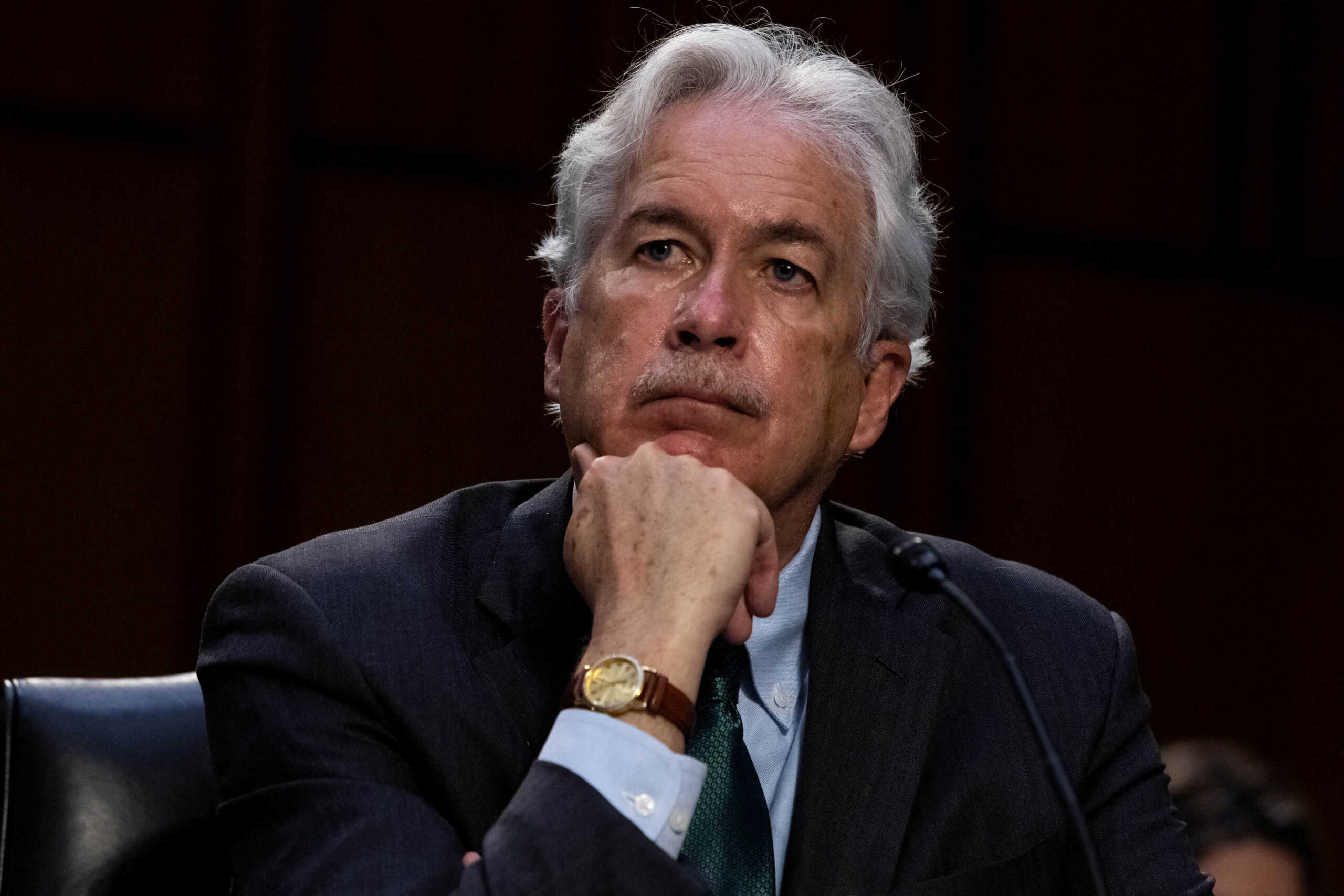 FILE PHOTO: CIA Director William Burns looks on during a Senate Select Committee on Intelligence hearing about worldwide threats, on Capitol Hill in Washington, DC, U.S., April 14, 2021. Graeme Jennings