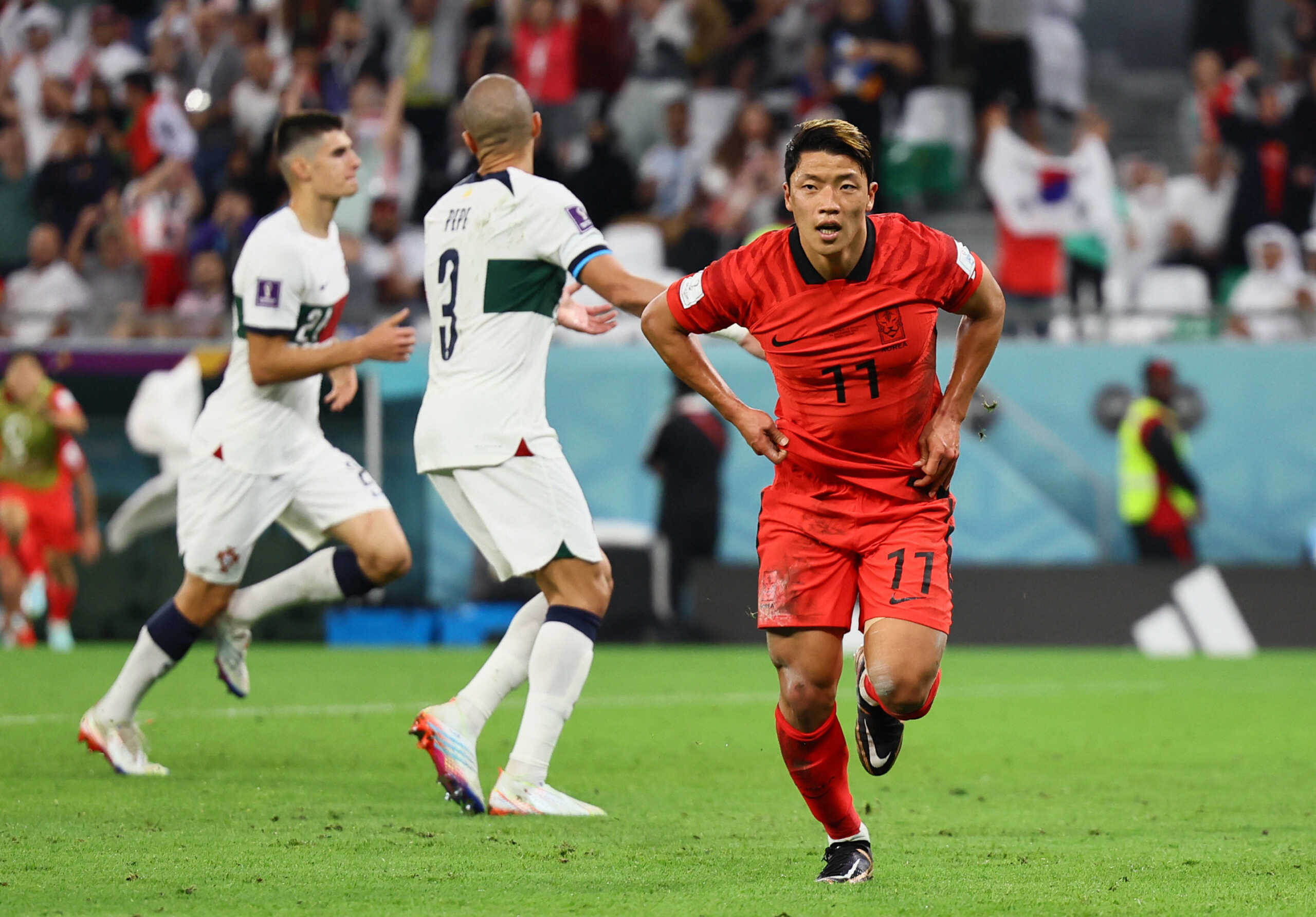Soccer Football - FIFA World Cup Qatar 2022 - Group H - South Korea v Portugal - Education City Stadium, Al Rayyan, Qatar - December 2, 2022  South Korea's Hwang Hee-chan celebrates scoring their second goal REUTERS