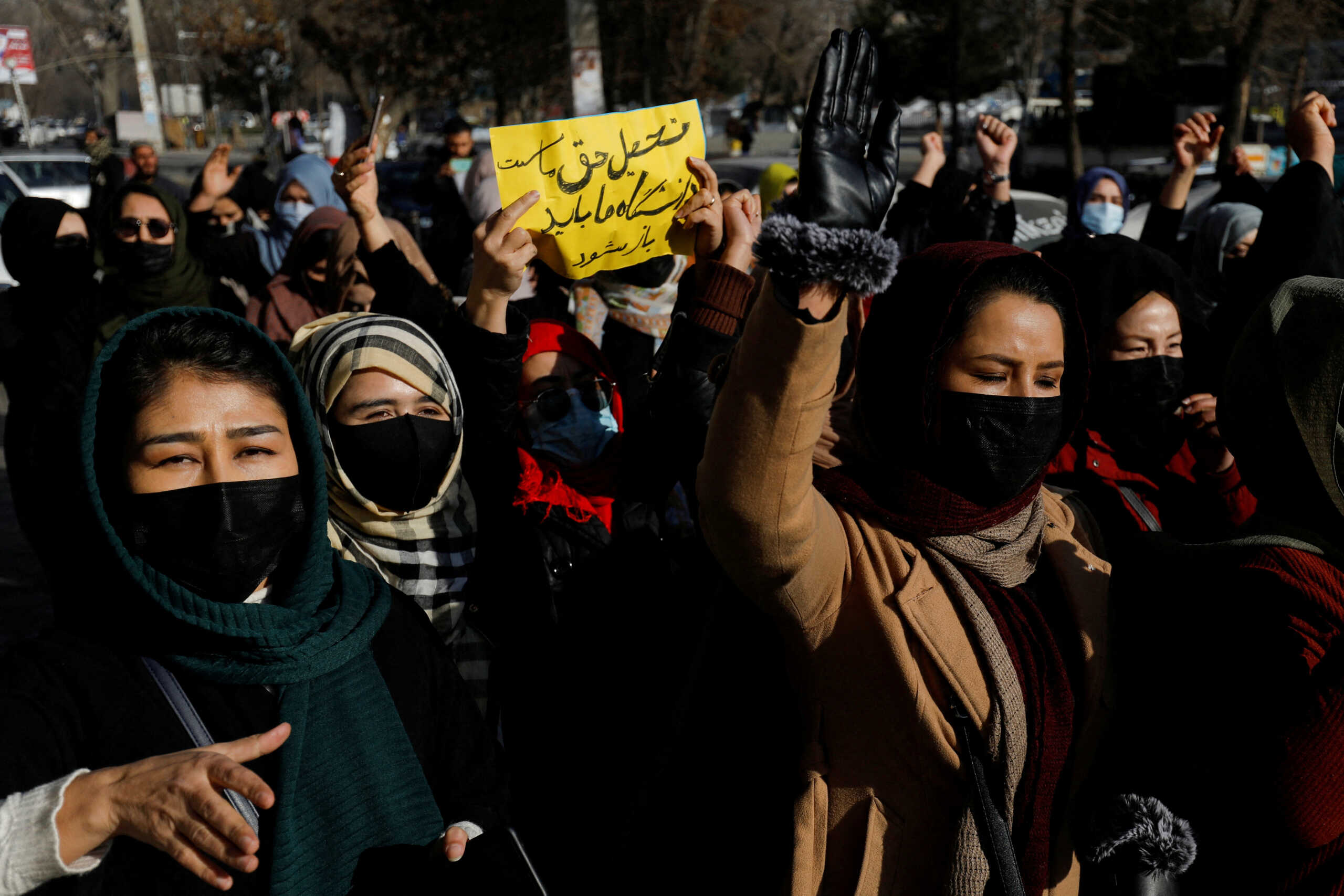 Afghan women chant slogans in protest against the closure of universities to women by the Taliban in Kabul, Afghanistan, December 22, 2022. REUTERS