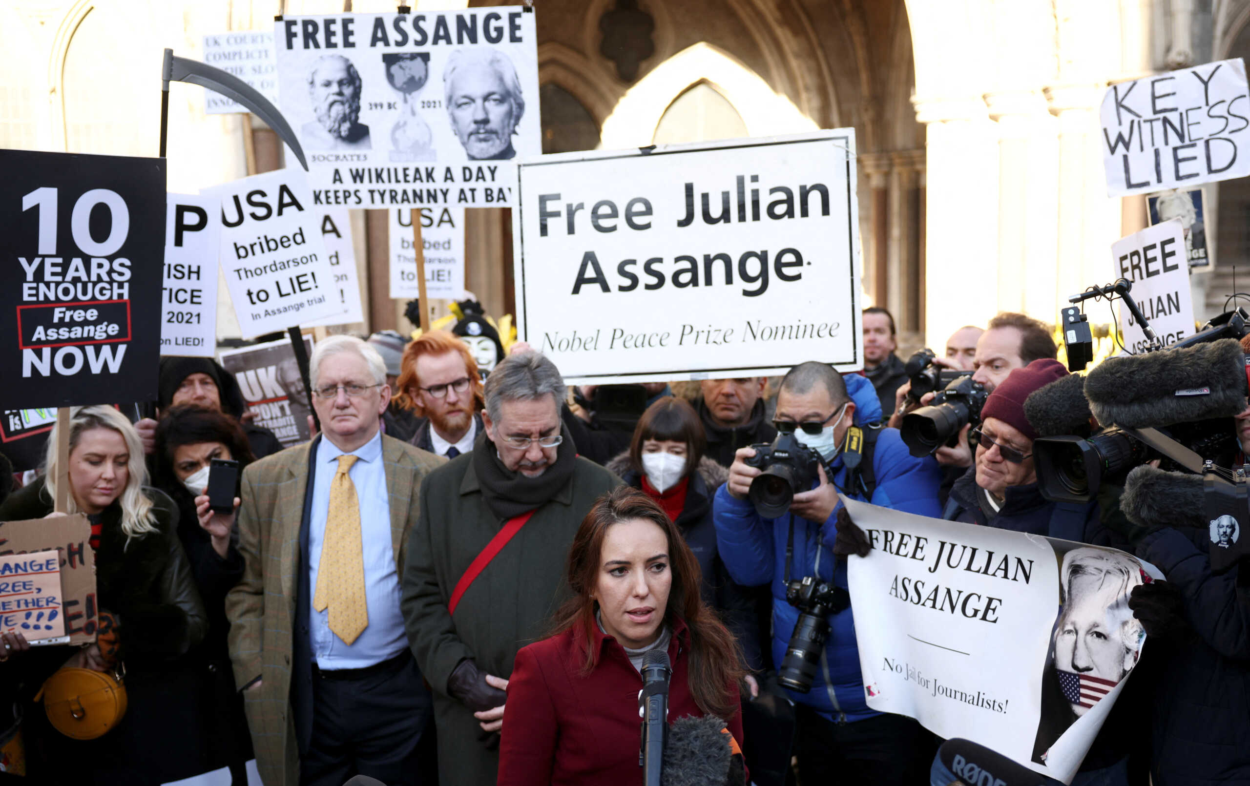 FILE PHOTO: Stella Morris, partner of Wikileaks founder Julian Assange, speaks to media outside the Royal Courts of Justice following the appeal against Assange's extradition in London, Britain December 10, 2021. REUTERS