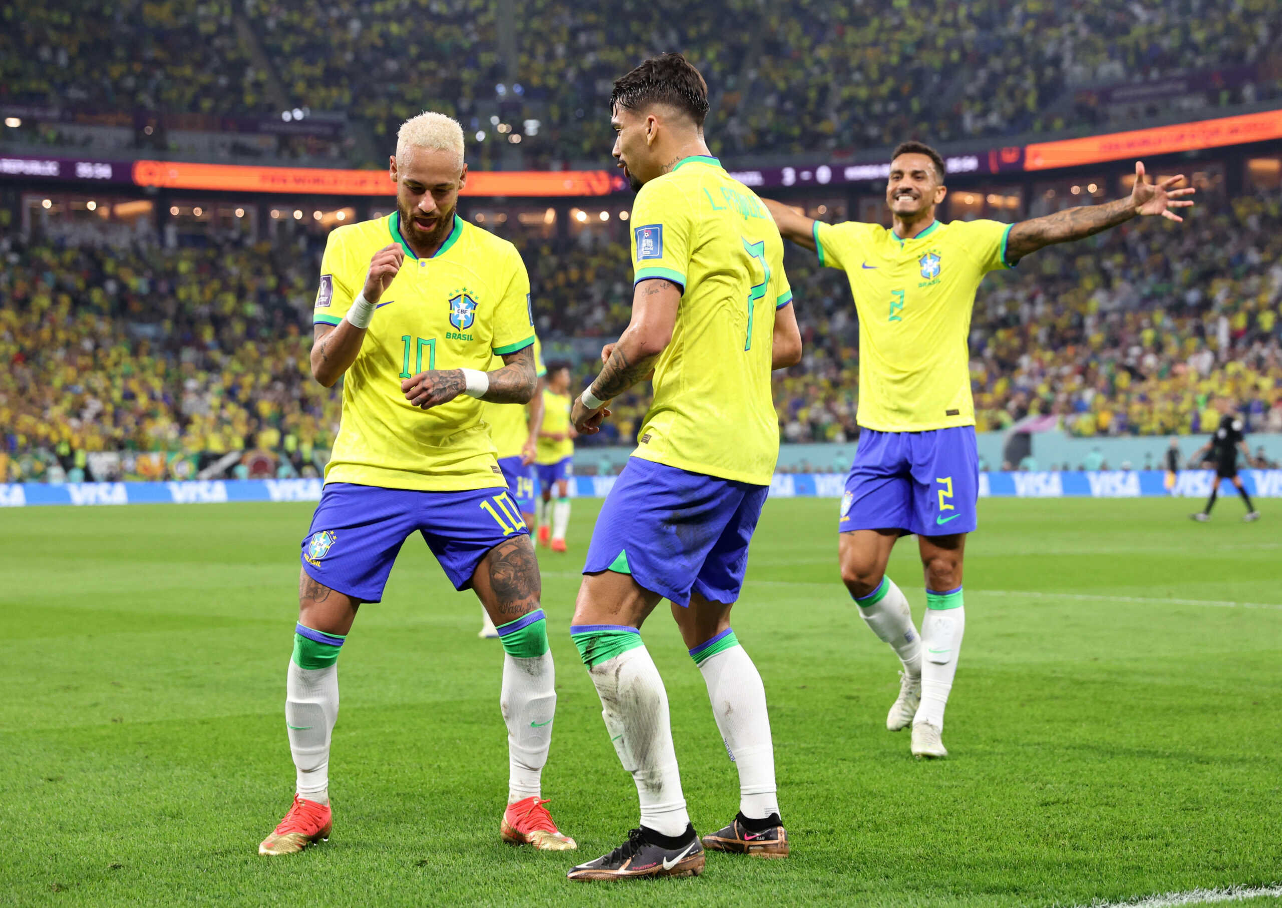 Soccer Football - FIFA World Cup Qatar 2022 - Round of 16 - Brazil v South Korea - Stadium 974, Doha, Qatar - December 5, 2022 Brazil's Lucas Paqueta celebrates scoring their fourth goal with Neymar REUTERS