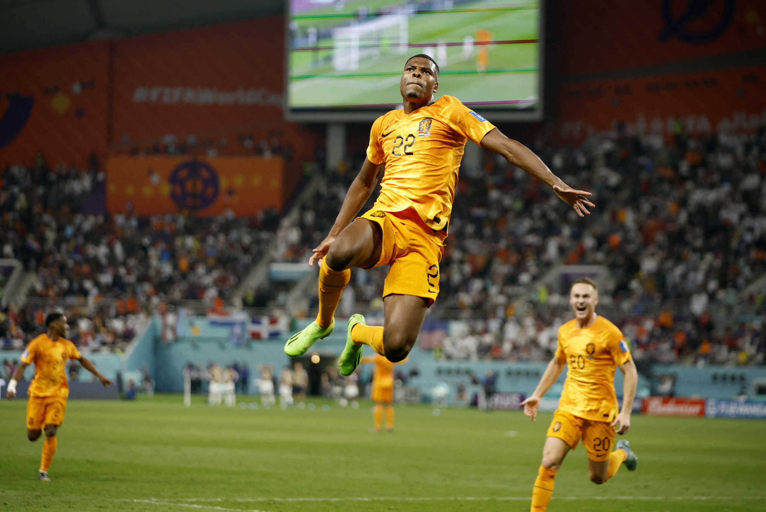 Soccer Football - FIFA World Cup Qatar 2022 - Round of 16 - Netherlands v United States - Khalifa International Stadium, Doha, Qatar - December 3, 2022 Netherlands' Denzel Dumfries celebrates scoring their third goal REUTERS