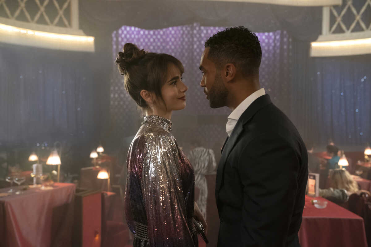 Emily in Paris. (L to R) Lily Collins as Emily, Lucien Laviscount as Alfie in episode 303 of Emily in Paris. Cr. Stéphanie Branchu