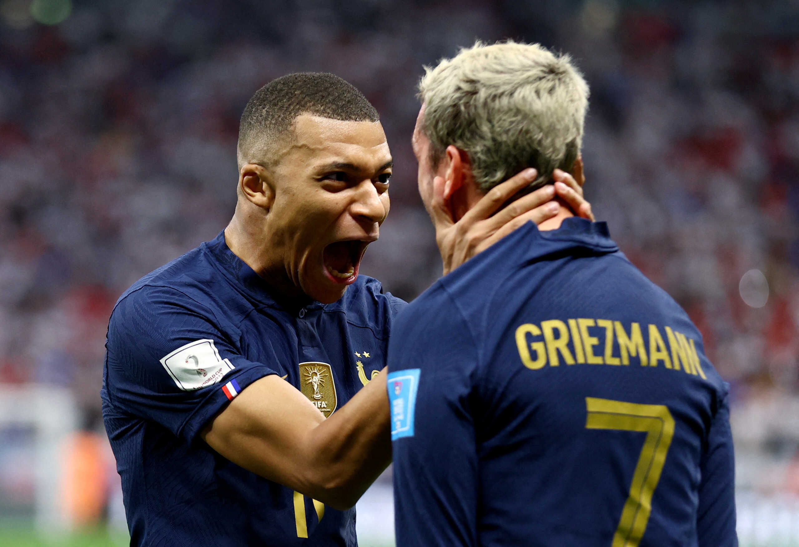 Soccer Football - FIFA World Cup Qatar 2022 - Quarter Final - England v France - Al Bayt Stadium, Al Khor, Qatar - December 10, 2022 France's Kylian Mbappe celebrates their second goal with Antoine Griezmann REUTERS