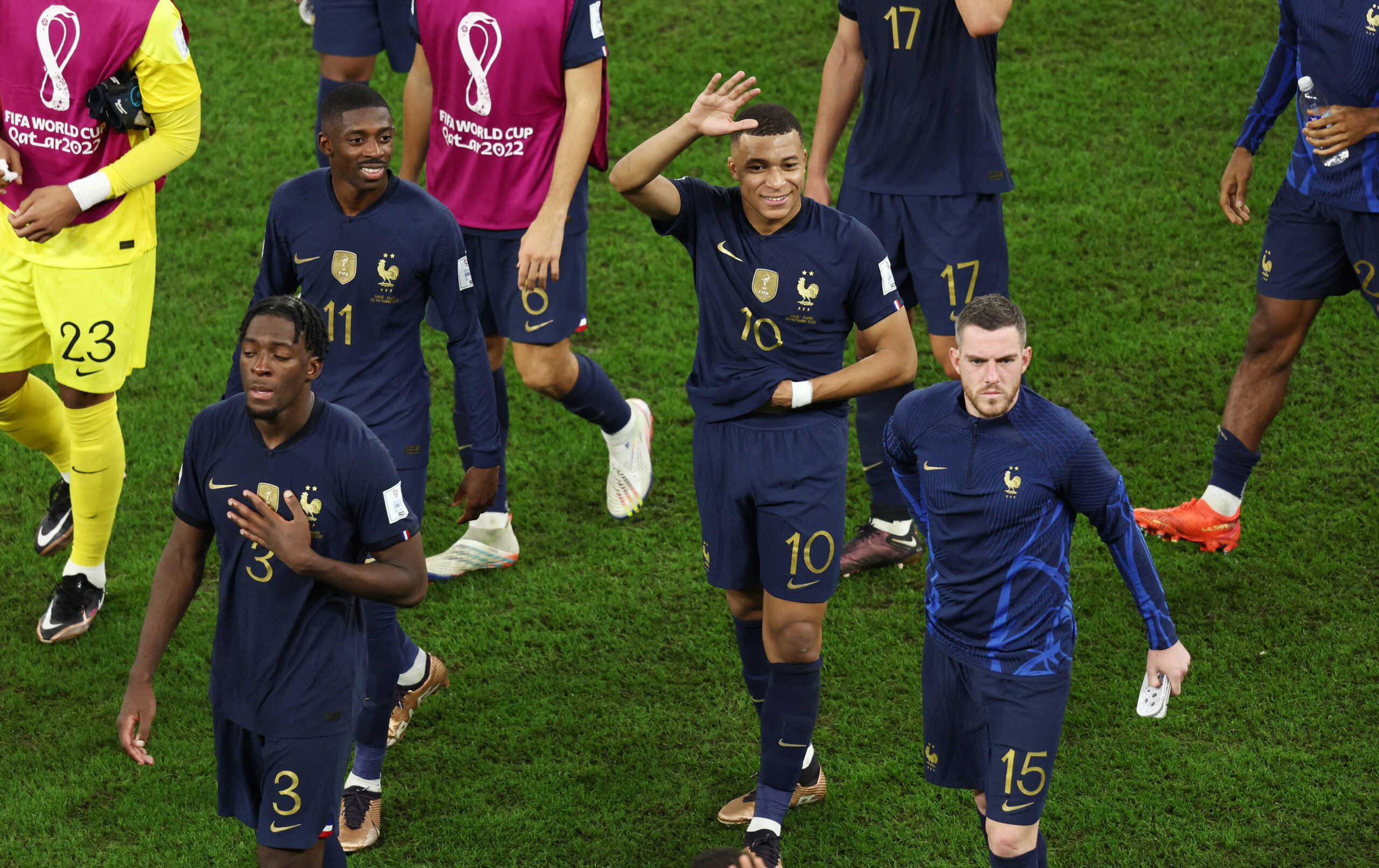 Soccer Football - FIFA World Cup Qatar 2022 - Group D - Tunisia v France - Education City Stadium, Al Rayyan, Qatar - November 30, 2022 France's Kylian Mbappe with teammates walk off the pitch after the match REUTERS