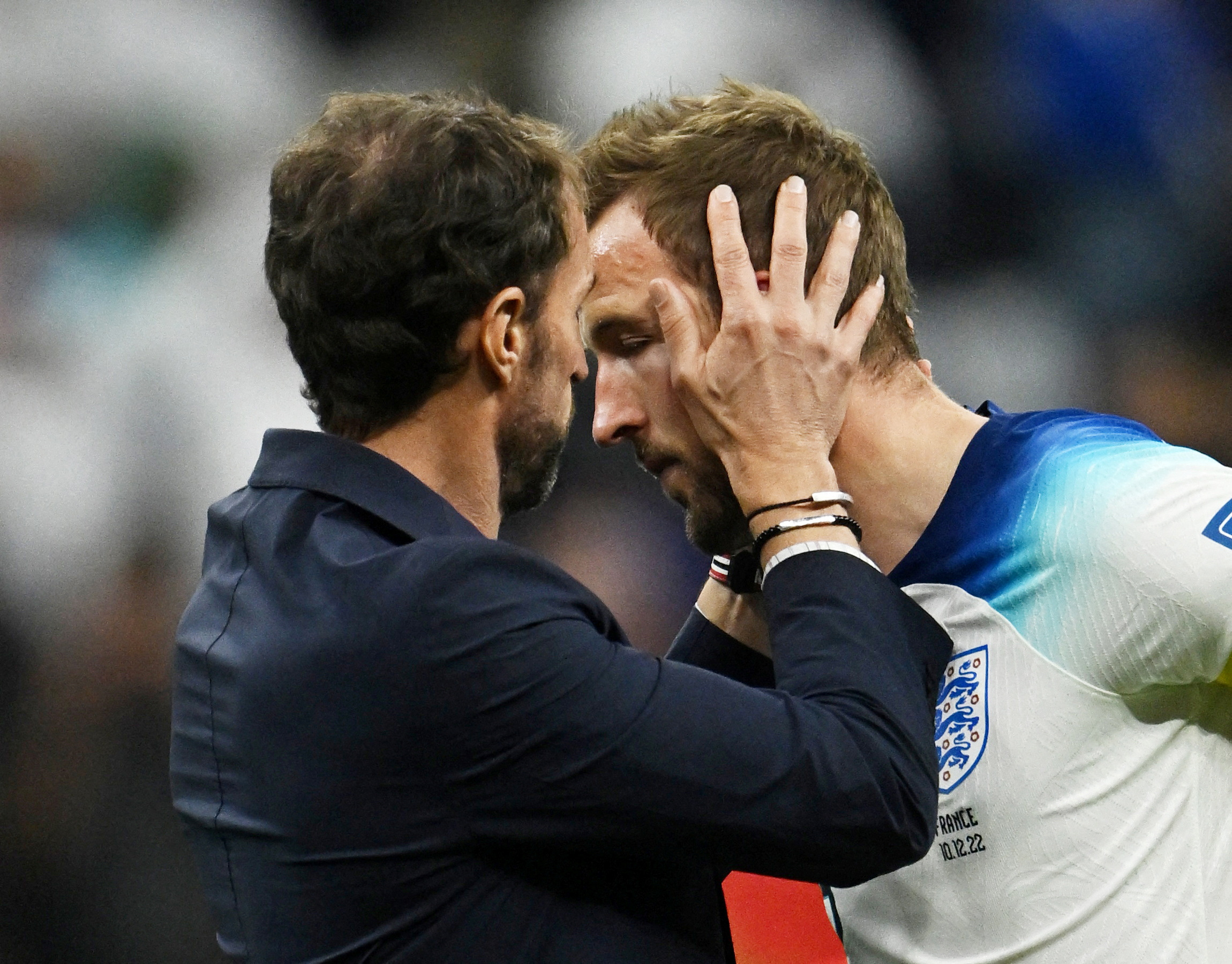Soccer Football - FIFA World Cup Qatar 2022 - Quarter Final - England v France - Al Bayt Stadium, Al Khor, Qatar - December 11, 2022 England's Harry Kane and manager Gareth Southgate look dejected after the match as England are eliminated from the World Cup REUTERS