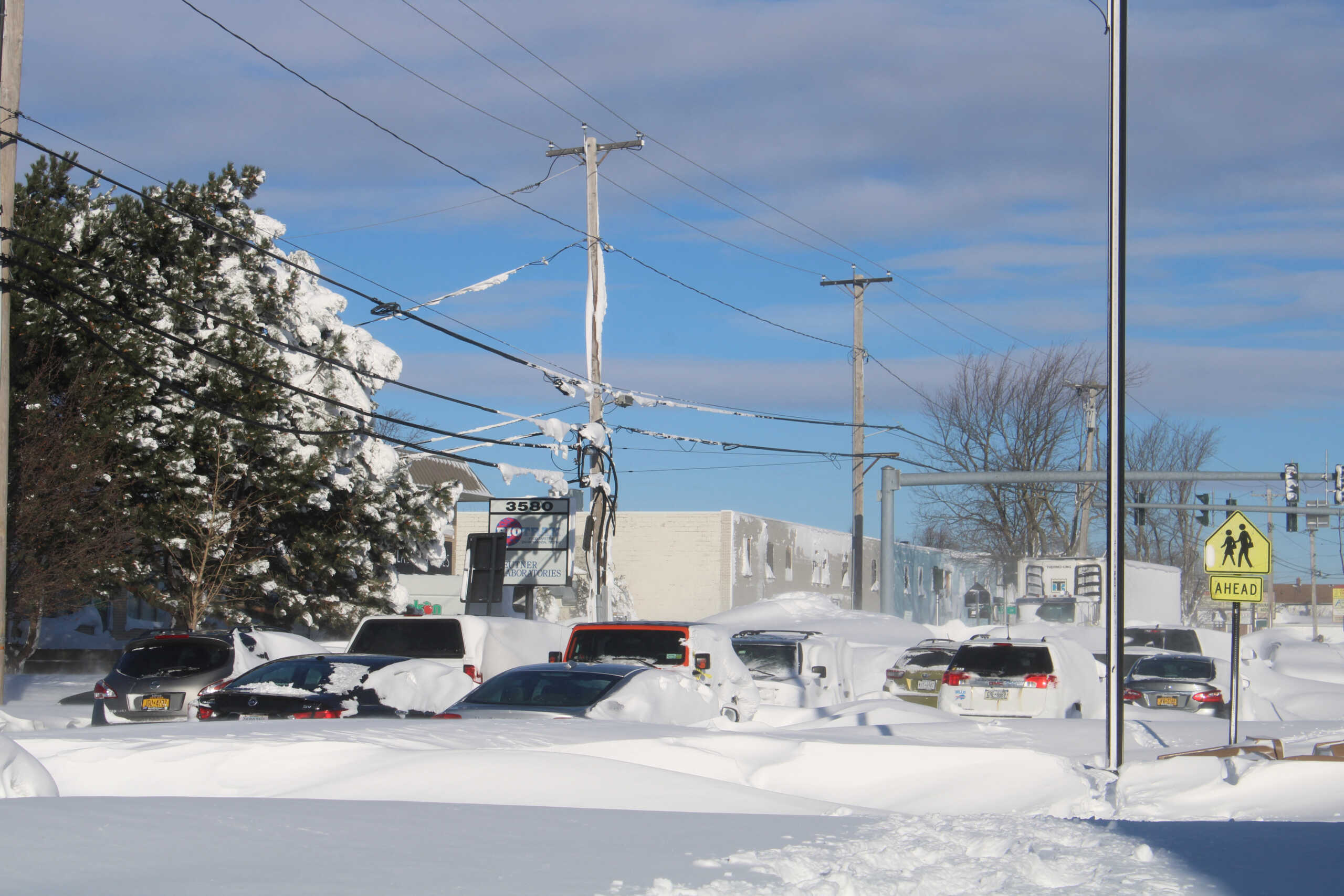 A general view of vehicles covered in snow on a road, following a winter storm that hit the region, in Buffalo, New York, U.S December 25, 2022, in this picture obtained by Reuters from social media on December 26, 2022. Instagram