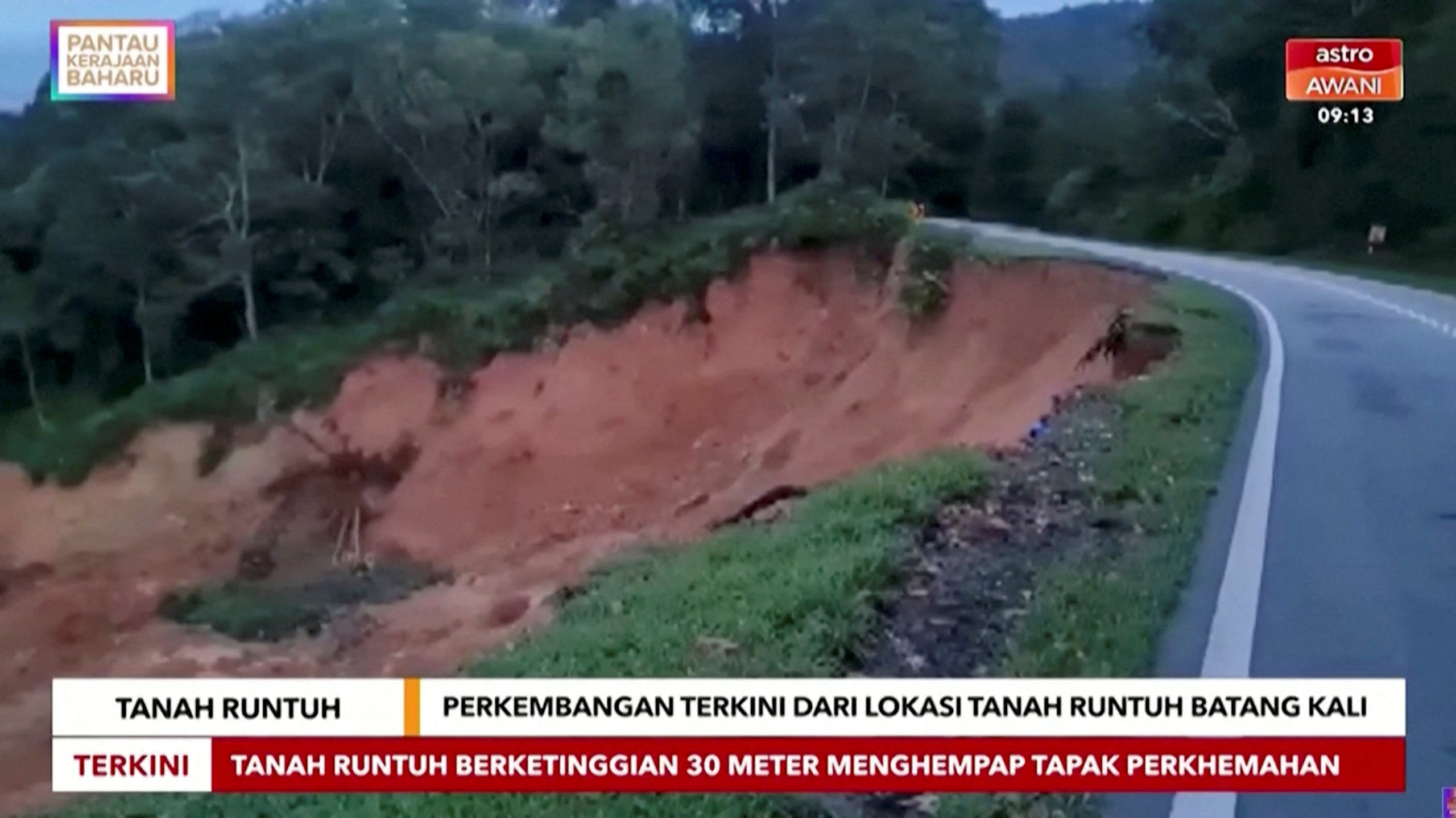A view of the scene after a landslide in Batang Kali, Malaysia, December 16, 2022 in this still image taken from video.  Astro Awani