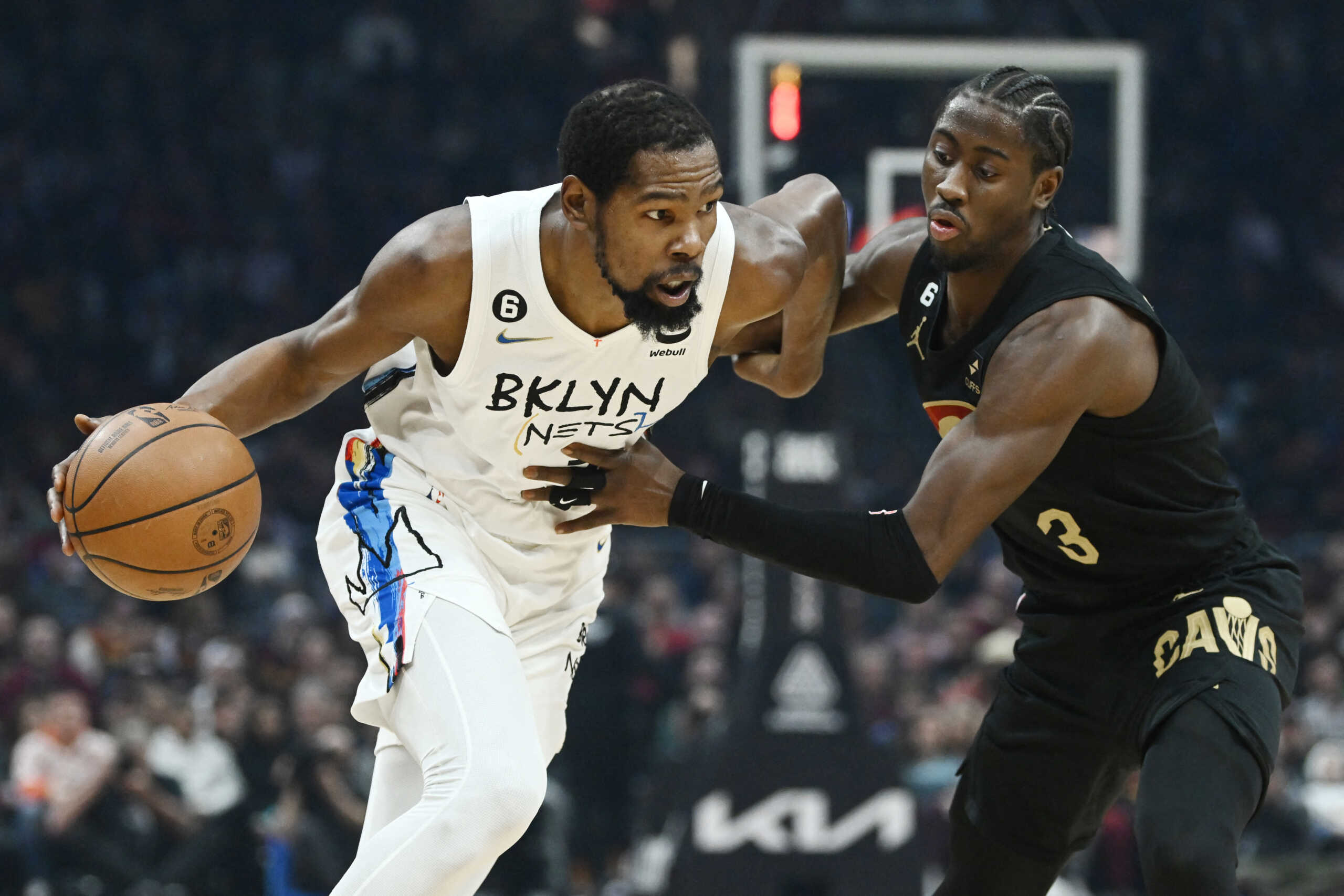 Dec 26, 2022; Cleveland, Ohio, USA; Brooklyn Nets forward Kevin Durant (7) drives to the basket against Cleveland Cavaliers guard Caris LeVert (3) during the first half at Rocket Mortgage FieldHouse. Mandatory Credit: Ken Blaze-USA TODAY Sports