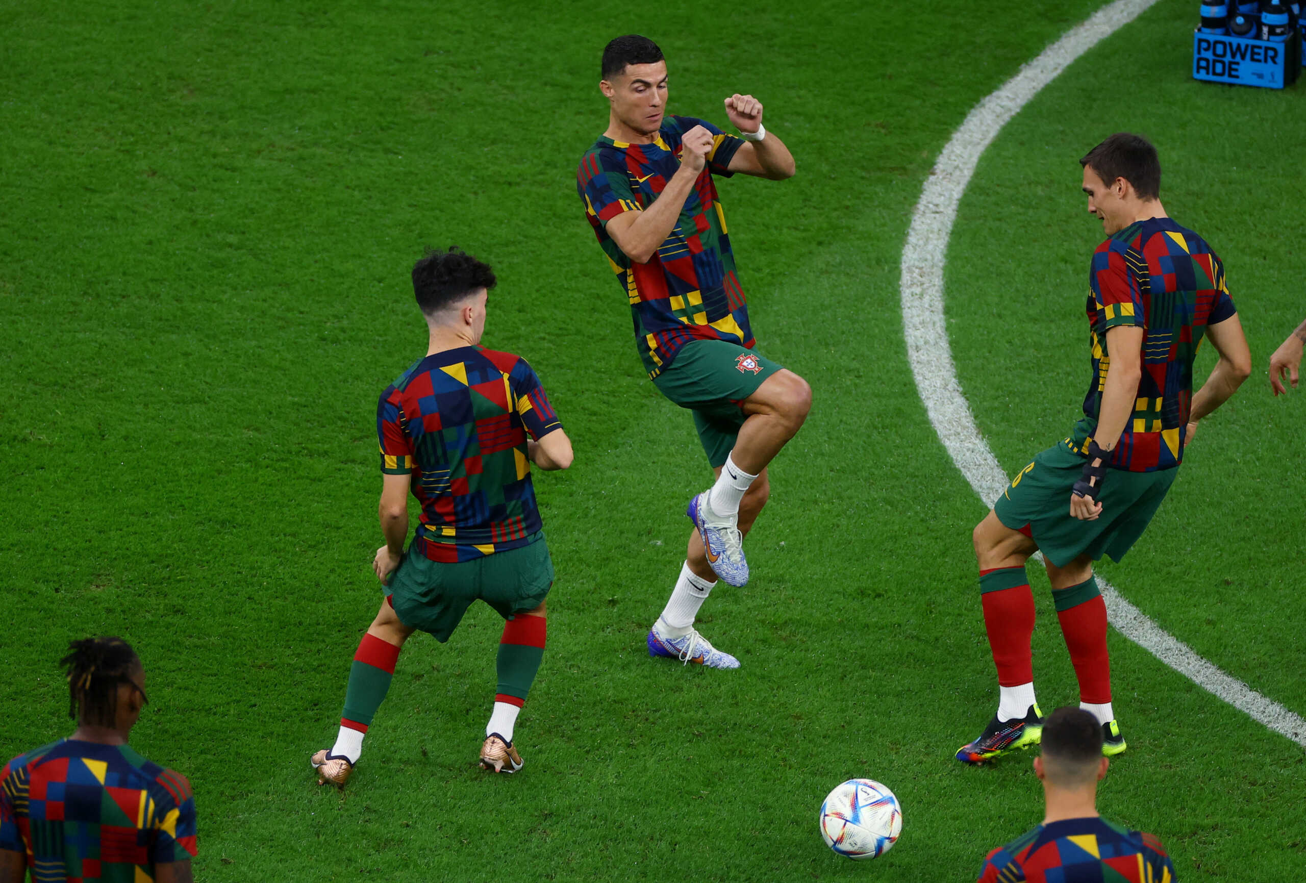 Soccer Football - FIFA World Cup Qatar 2022 - Round of 16 - Portugal v Switzerland - Lusail Stadium, Lusail, Qatar - December 6, 2022 Portugal's Cristiano Ronaldo and teammates during the warm up before the match REUTERS