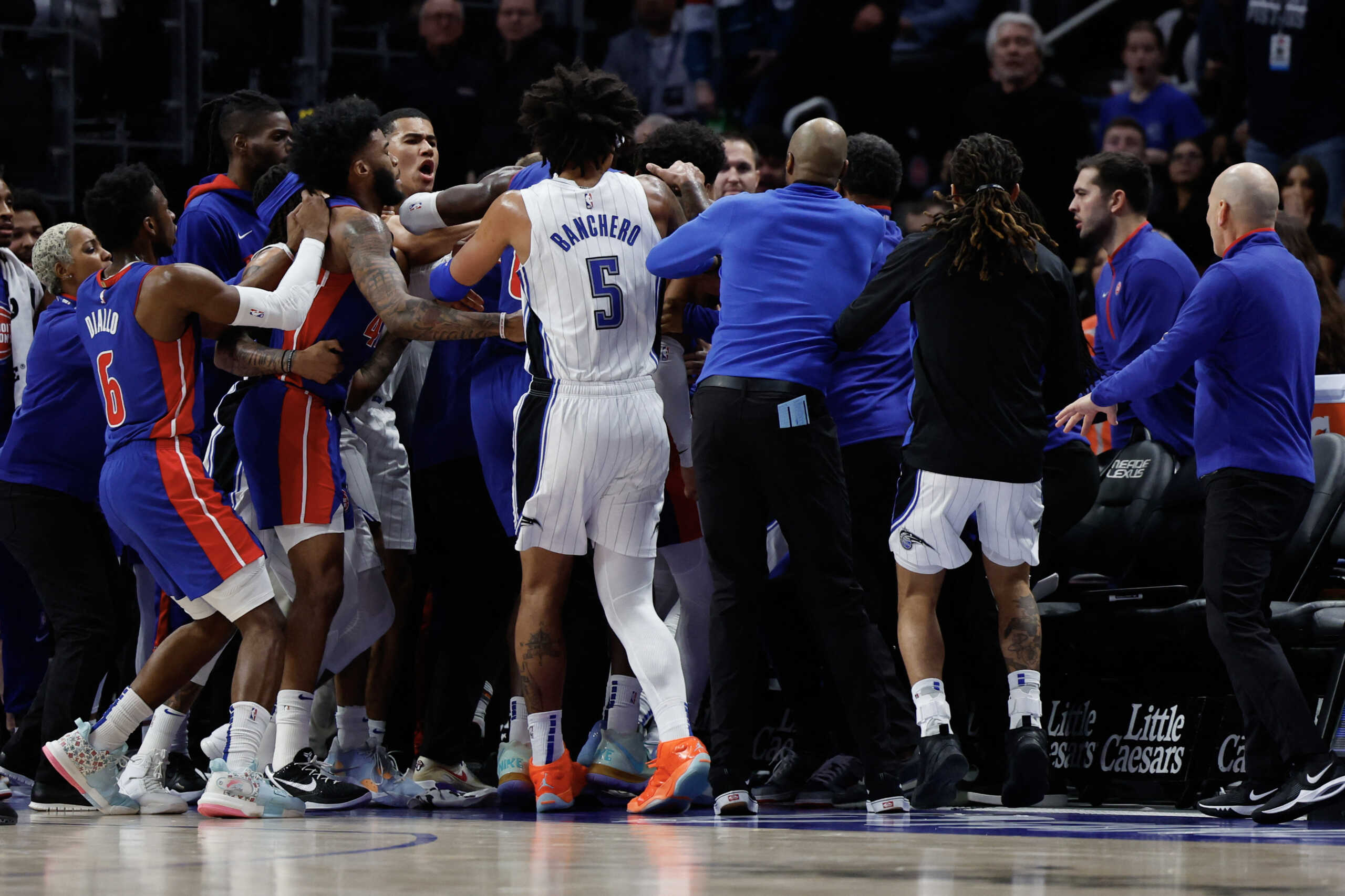 Dec 28, 2022; Detroit, Michigan, USA;  Orlando Magic forward Paolo Banchero (5) rush towards the the Detroit Pistons bench in the first half at Little Caesars Arena. Mandatory Credit: Rick Osentoski-USA TODAY Sports