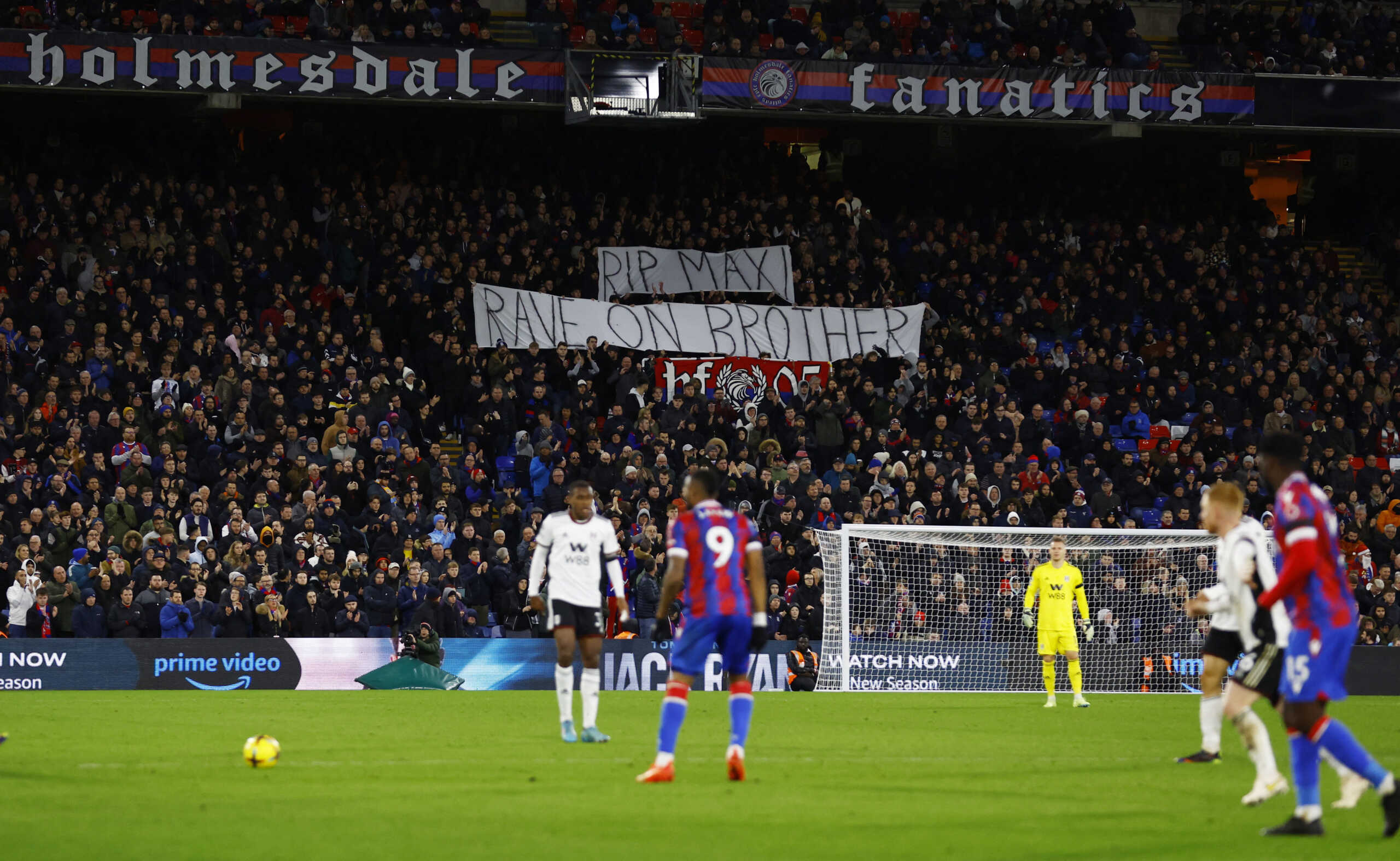 Soccer Football - Premier League - Crystal Palace v Fulham - Selhurst Park, London, Britain - December 26, 2022 Crystal Palace fans with a banner in memory of singer Maxi Jazz during the match Action Images via Reuters