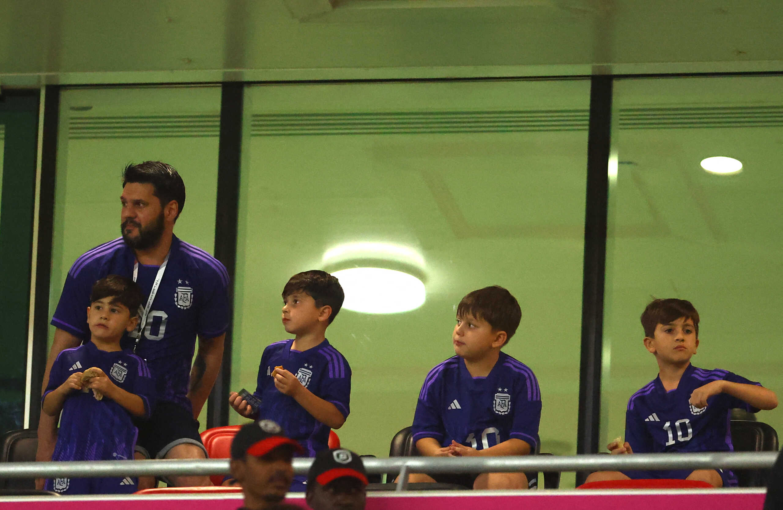 Soccer Football - FIFA World Cup Qatar 2022 - Round of 16 - Argentina v Australia - Ahmad bin Ali Stadium, Al Rayyan, Qatar - December 3, 2022 Children of Argentina's Lionel Messi seen inside the stadium before the match REUTERS