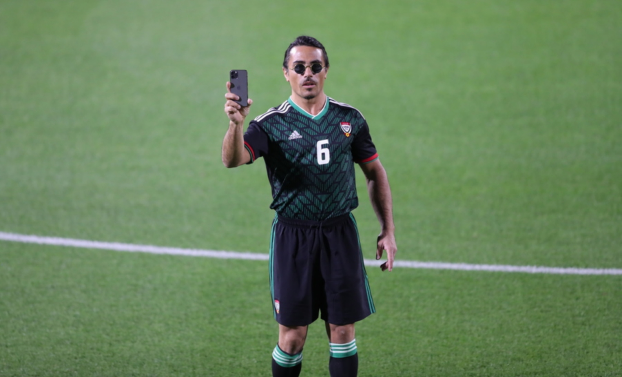 epa08926901 Turkish chef Nusret Gokce 'Salt Bae' attends an exhibition soccer match played by International legend players including Emiratis players and UAE officials in Gulf emirate of Dubai, United Arab Emirates, 08 January 2021.  EPA