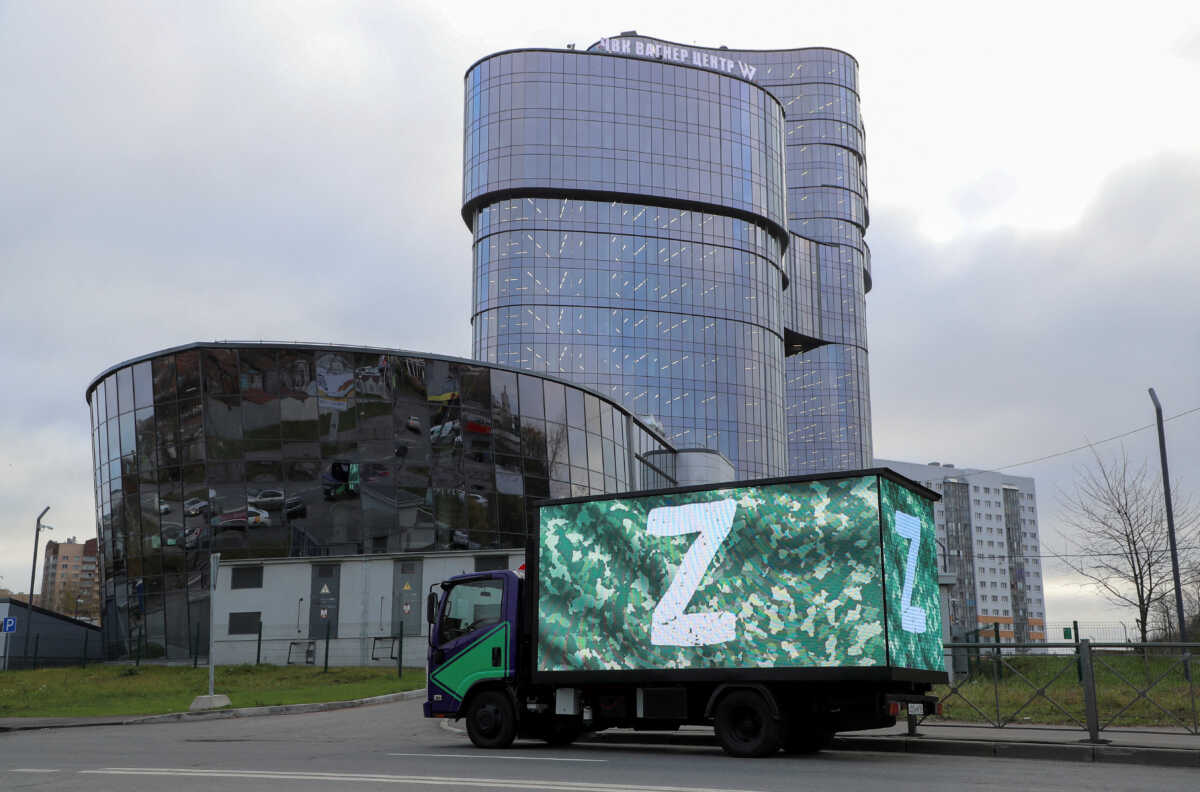 FILE PHOTO: A truck displaying the symbols "Z" in support of the Russian armed forces involved in a military conflict in Ukraine is parked outside PMC Wagner Centre, which is a project implemented by the businessman and founder of the Wagner private military group Yevgeny Prigozhin, during the official opening of the office block in Saint Petersburg, Russia, November 4, 2022. REUTERS
