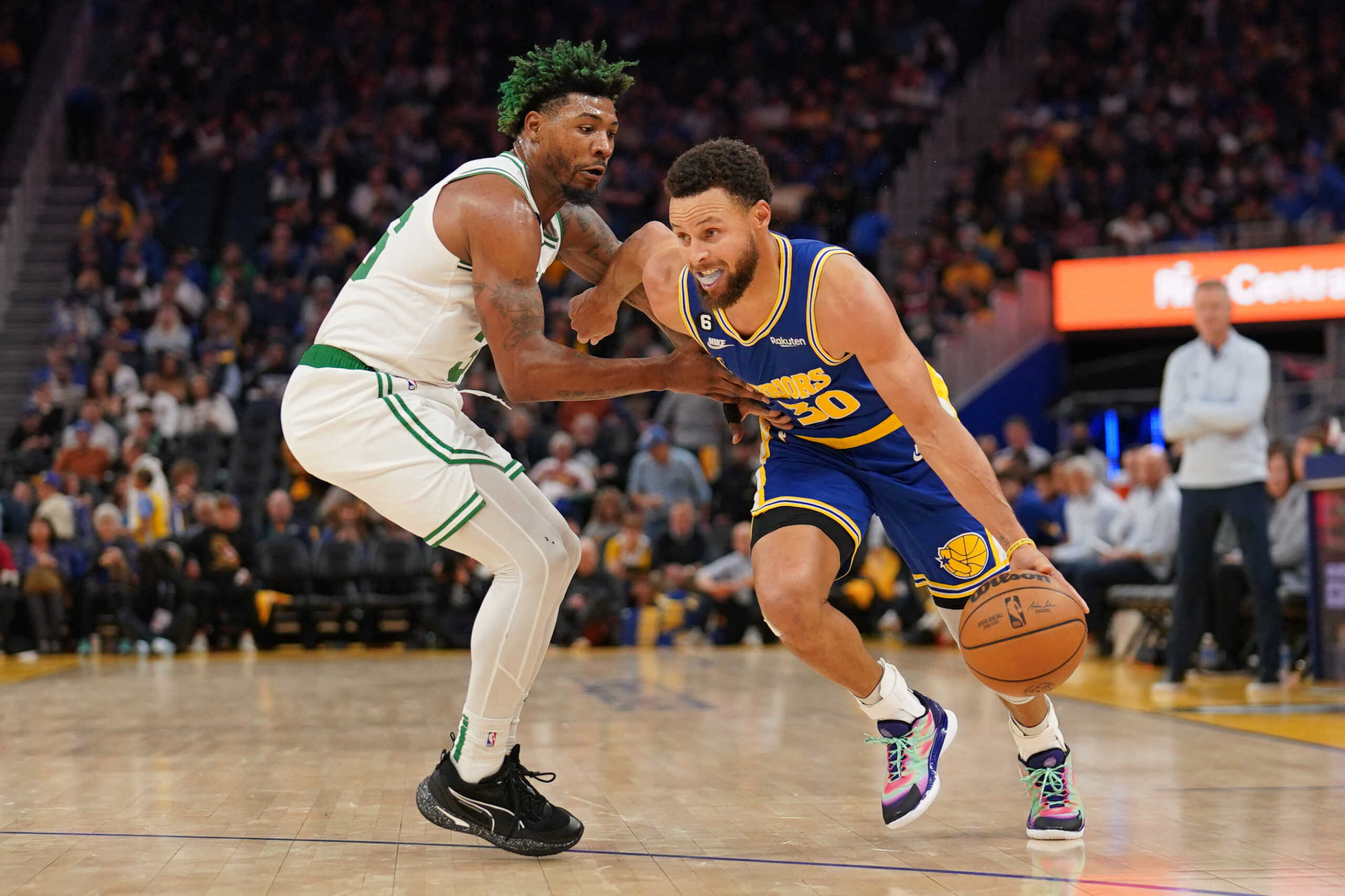 Dec 10, 2022; San Francisco, California, USA; Golden State Warriors guard Stephen Curry (30) dribbles against Boston Celtics guard Marcus Smart (36) in the third quarter at the Chase Center. Mandatory Credit: Cary Edmondson-USA TODAY Sports