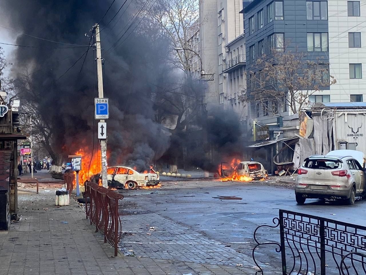 SENSITIVE MATERIAL. THIS IMAGE MAY OFFEND OR DISTURB. Cars burn on a street after a Russian military strike, amid Russia's attack of Ukraine, in Kherson, Ukraine December 24, 2022. Ukrainian Presidential Press Service