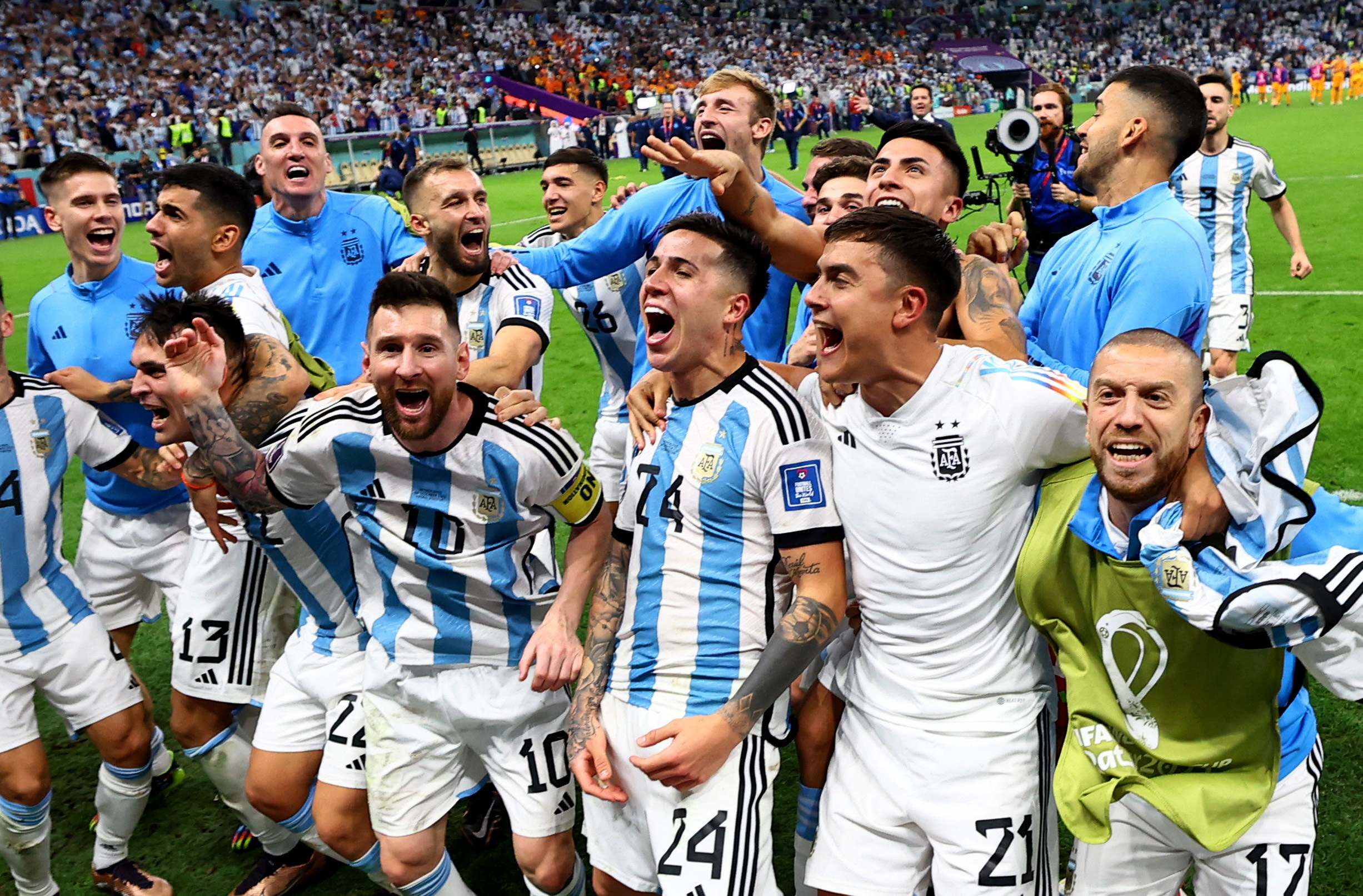 Soccer Football - FIFA World Cup Qatar 2022 - Quarter Final - Netherlands v Argentina - Lusail Stadium, Lusail, Qatar - December 10, 2022 Argentina's Lionel Messi, Enzo Fernandes, Paulo Dybala, Geronimo Rulli and teammates celebrate qualifying for the semi finals REUTERS