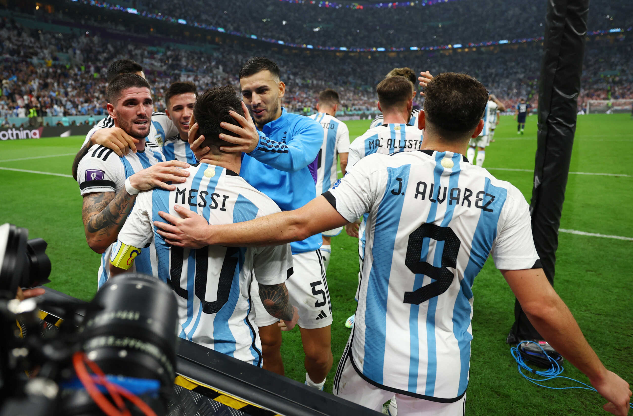 Soccer Football - FIFA World Cup Qatar 2022 - Semi Final - Argentina v Croatia - Lusail Stadium, Lusail, Qatar - December 13, 2022 Argentina's Julian Alvarez celebrates scoring their third goal with teammates REUTERS
