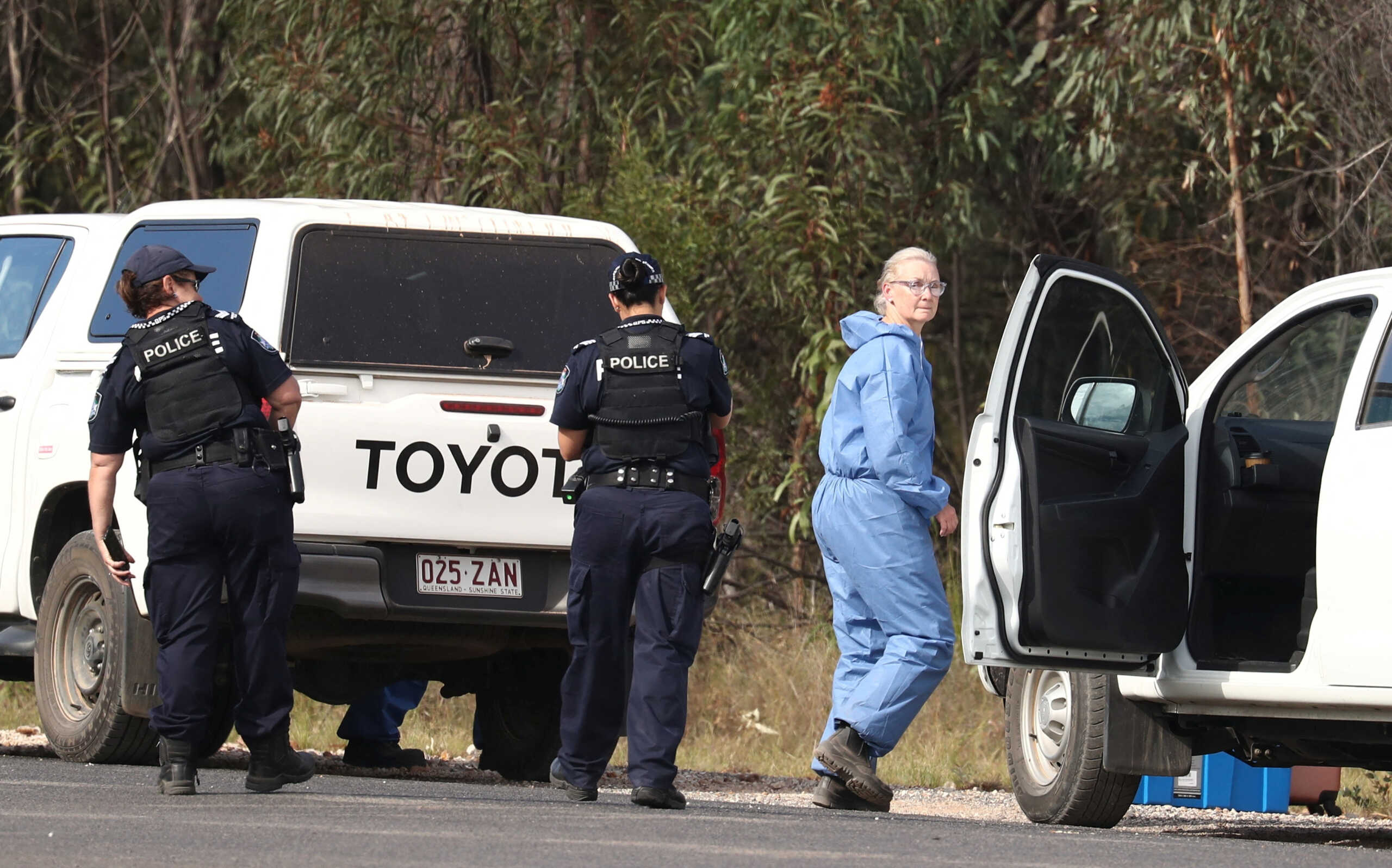 Police work near the scene of a fatal shooting, where police shot multiple people at a remote Queensland property after an ambush in which two officers and a bystander were also killed, in Wieambilla, Australia, December 13, 2022.  AAP Image