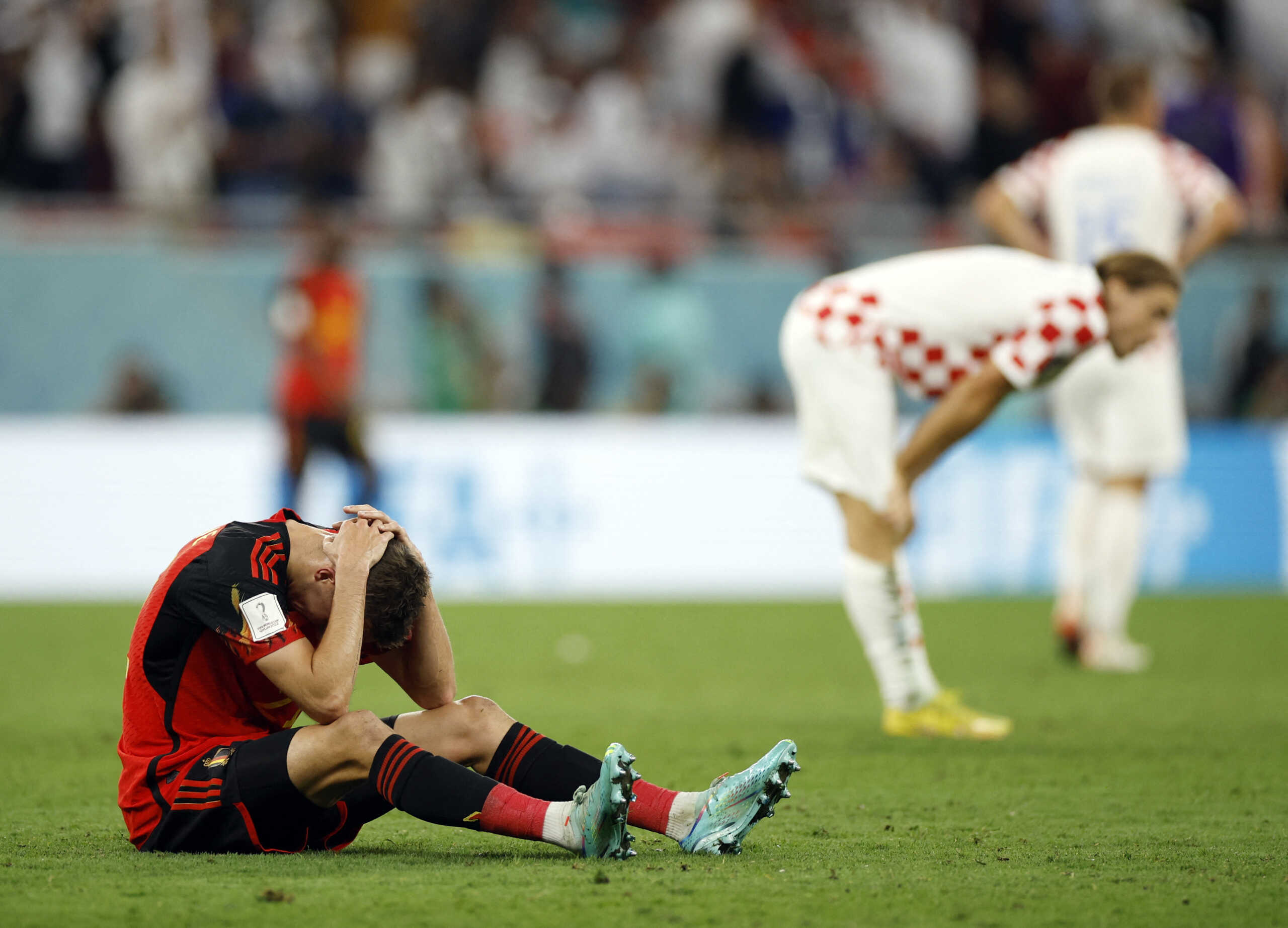 Soccer Football - FIFA World Cup Qatar 2022 - Group F - Croatia v Belgium - Ahmad Bin Ali Stadium, Al Rayyan, Qatar - December 1, 2022  Belgium's Timothy Castagne looks dejected after the match as Belgium are eliminated from the World Cup REUTERS