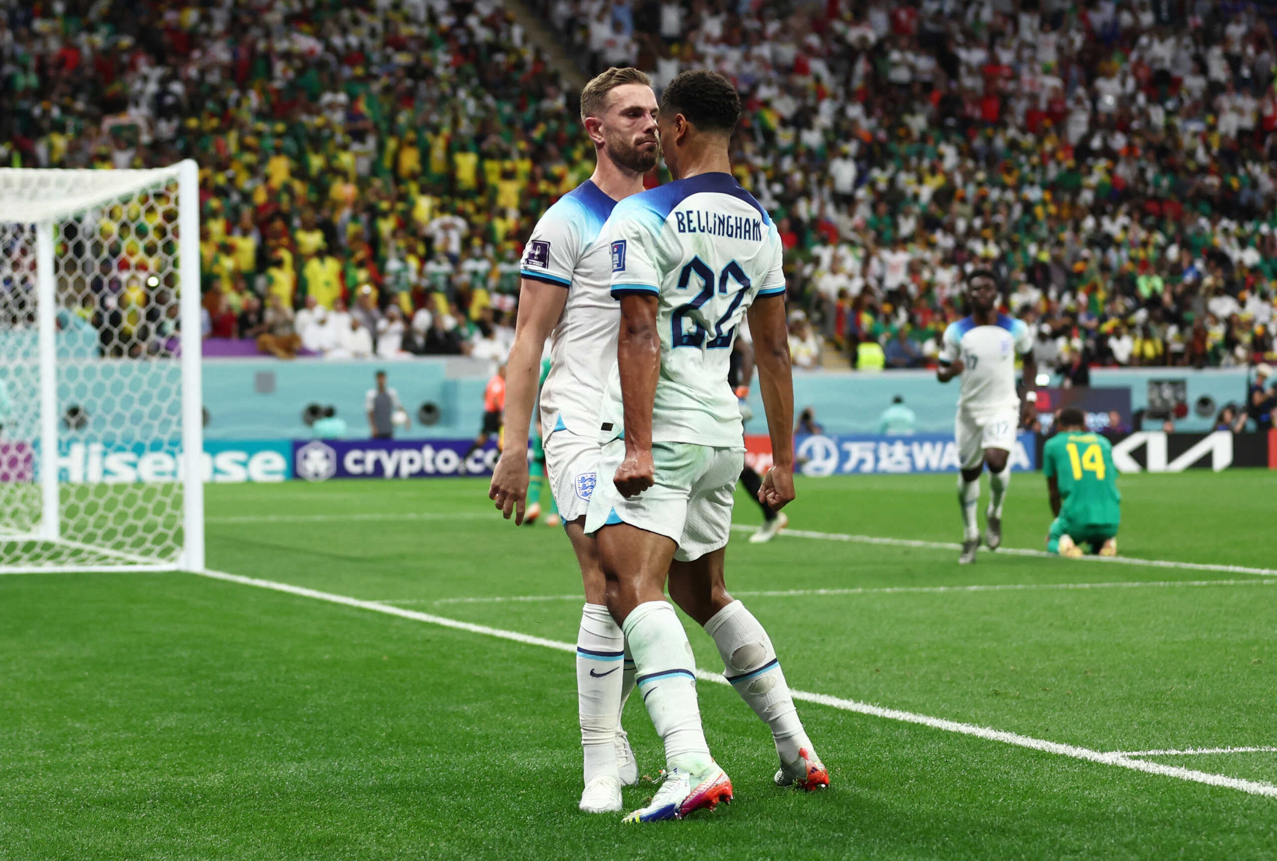 Soccer Football - FIFA World Cup Qatar 2022 - Round of 16 - England v Senegal - Al Bayt Stadium, Al Khor, Qatar - December 4, 2022 England's Jordan Henderson celebrates scoring their first goal with teammate Jude Bellingham REUTERS