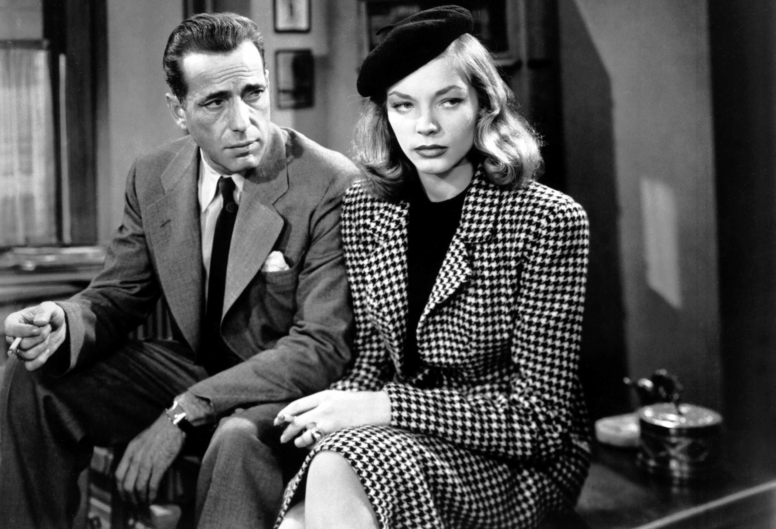 Humphrey Bogart (1889 - 1957) as Philip Marlowe and Lauren Bacall as Vivian Rutledge in 'The Big Sleep', 1946. (Photo by Silver Screen Collection