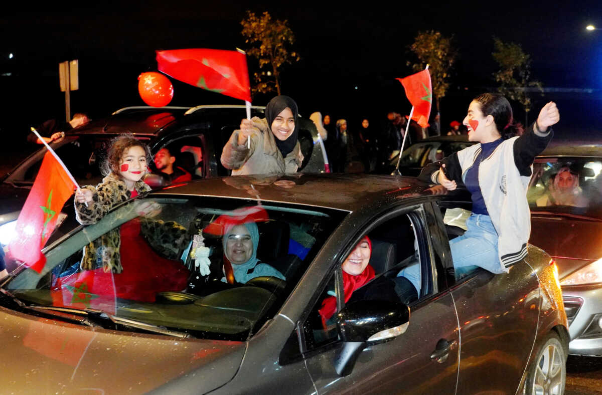 Soccer Football - FIFA World Cup Qatar 2022 - Morocco fans in Casablanca celebrate after the Canada v Morocco world cup match - Casablanca, Morocco - December 1, 2022 Morocco fans in Casablanca celebrate in a car after the Canada v Morocco world cup match REUTERS