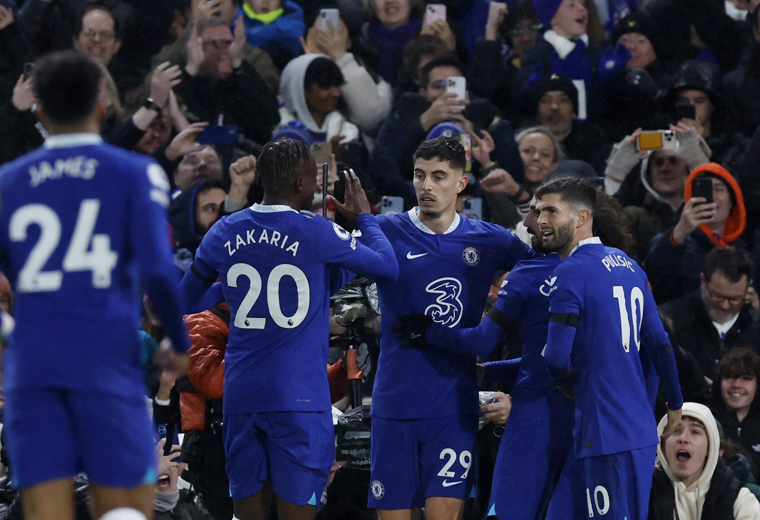 Soccer Football - Premier League - Chelsea v AFC Bournemouth - Stamford Bridge, London, Britain - December 27, 2022 Chelsea's Kai Havertz celebrates scoring their first goal with Christian Pulisic and Denis Zakaria Action Images via Reuters