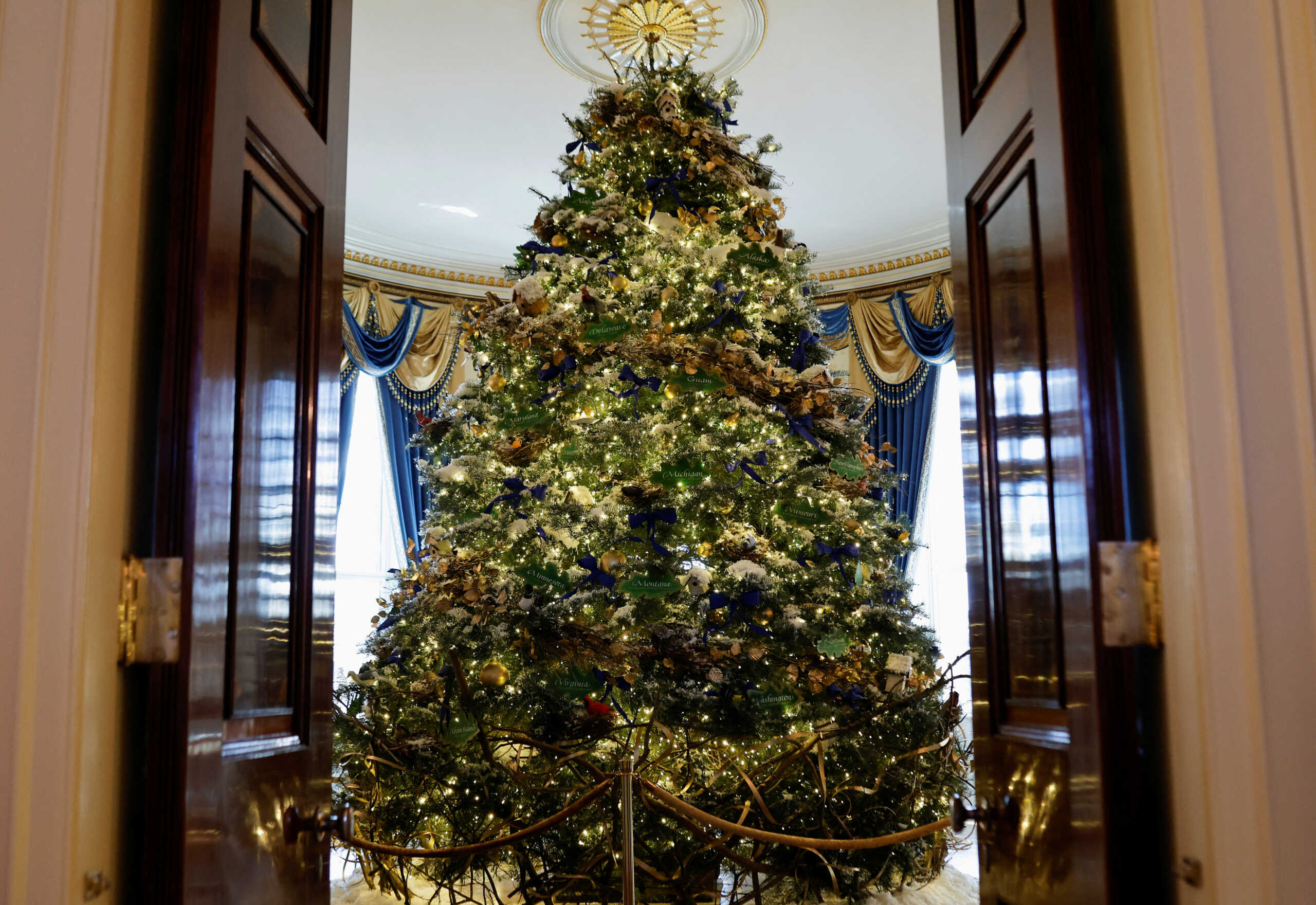The White House Christmas tree is seen as Christmas decorations on the theme "We the People" are unveiled during a press tour ahead of holiday receptions by U.S. President Joe Biden and first lady Jill Biden, at the White House in Washington, D.C., U.S. November 28, 2022. REUTERS