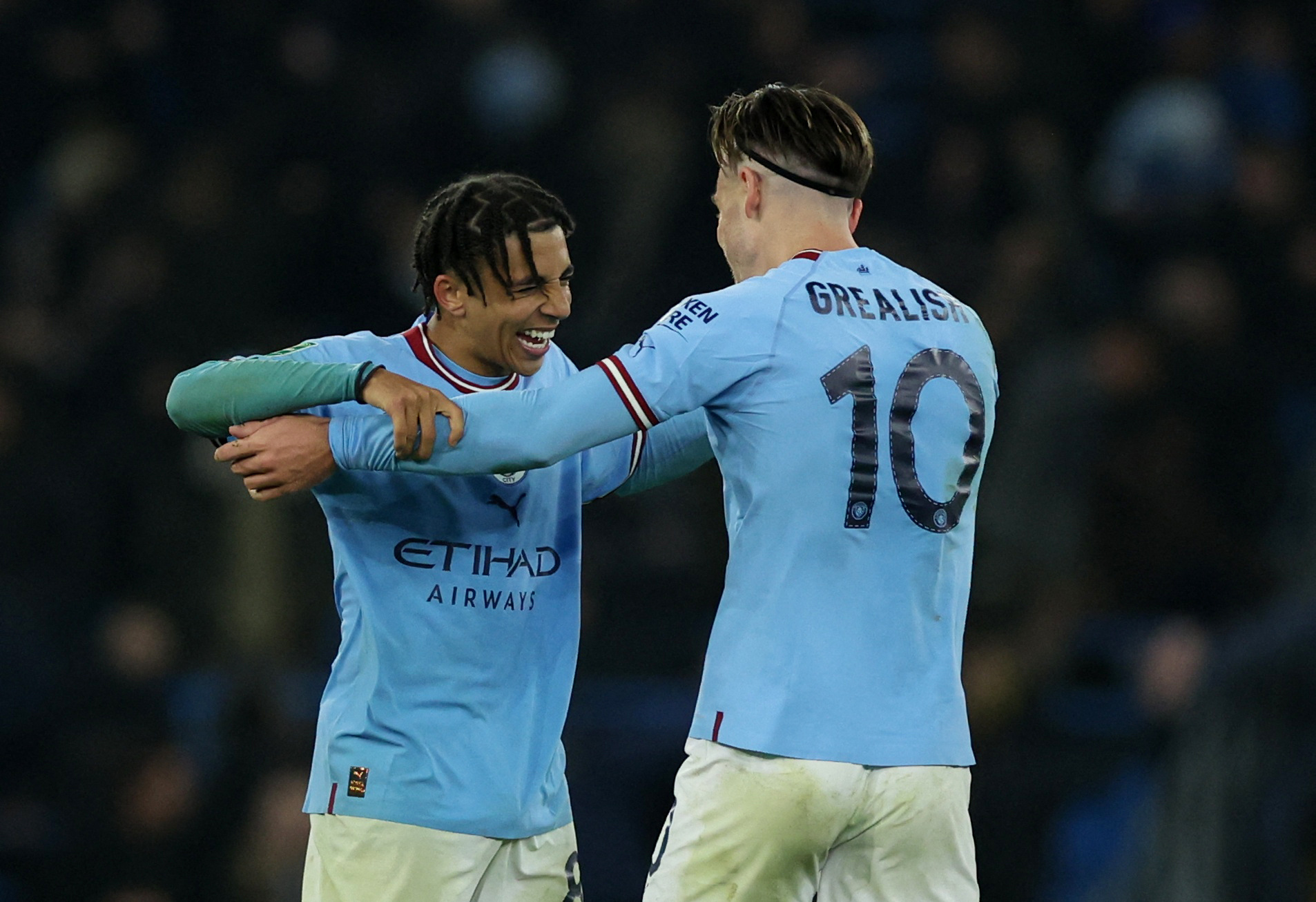 Soccer Football - Carabao Cup - Round of 16 - Manchester City v Liverpool - Etihad Stadium, Manchester, Britain - December 22, 2022 Manchester City's Jack Grealish with Manchester City's Rico Lewis after the match REUTERS