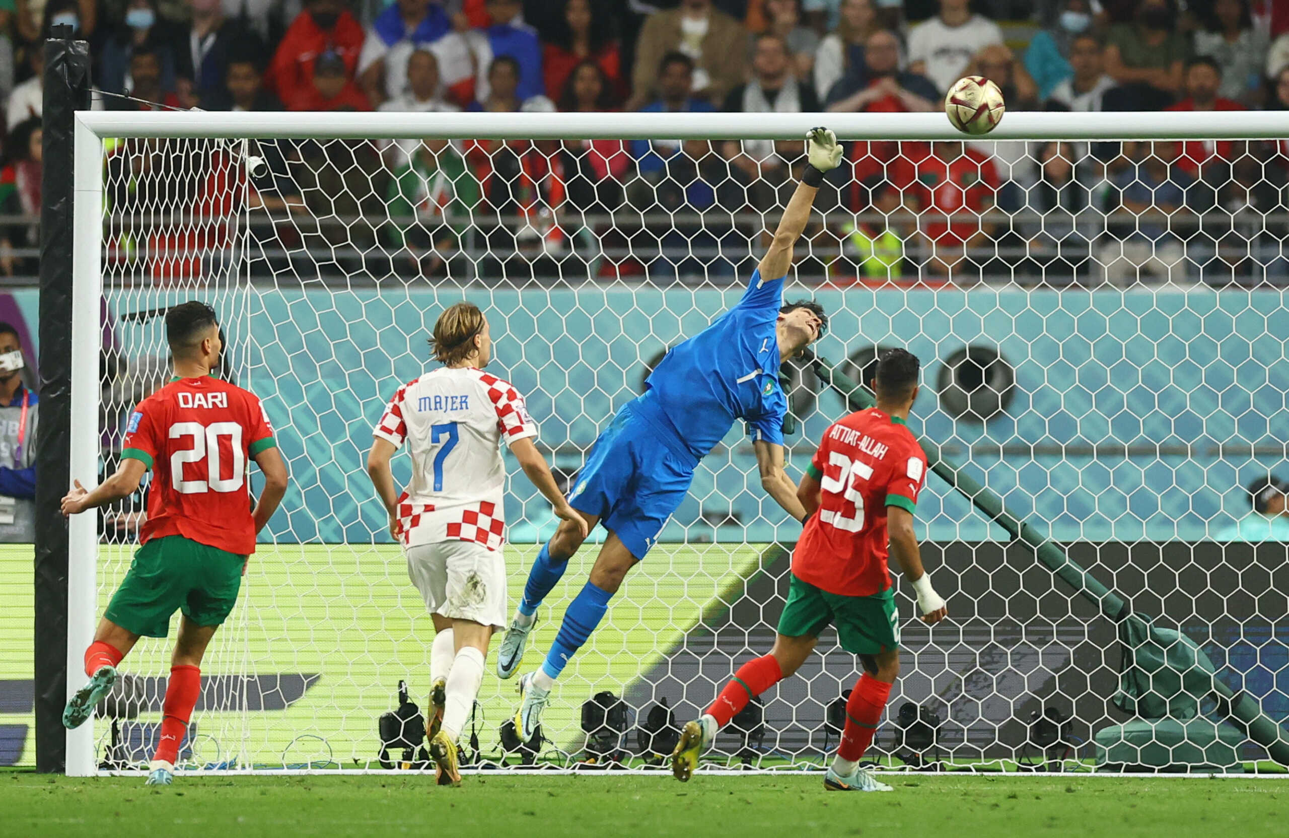 Soccer Football - FIFA World Cup Qatar 2022 - Third-Place Playoff - Croatia v Morocco - Khalifa International Stadium, Doha, Qatar - December 17, 2022 Croatia's Mislav Orsic scores their second goal (not pictured) pass Morocco's Yassine Bounou REUTERS