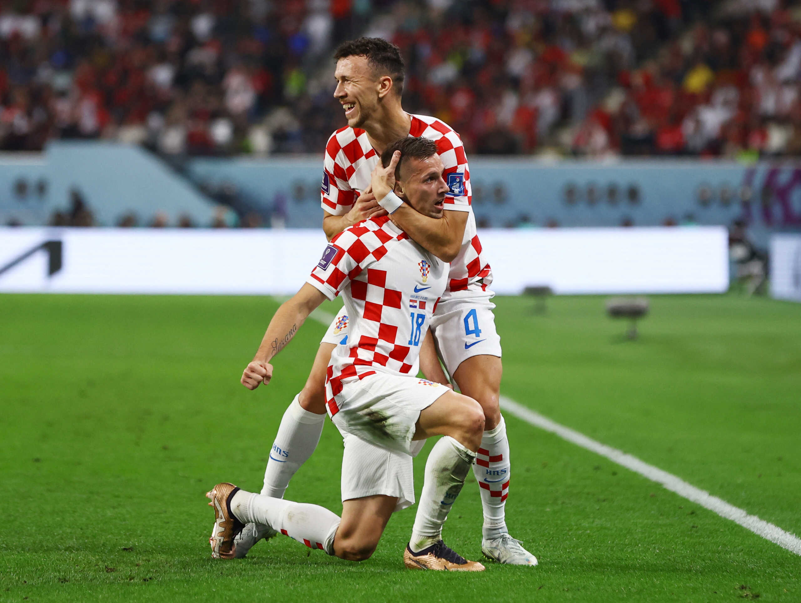 Soccer Football - FIFA World Cup Qatar 2022 - Third-Place Playoff - Croatia v Morocco - Khalifa International Stadium, Doha, Qatar - December 17, 2022 Croatia's Mislav Orsic celebrates scoring their second goal with Ivan Perisic REUTERS