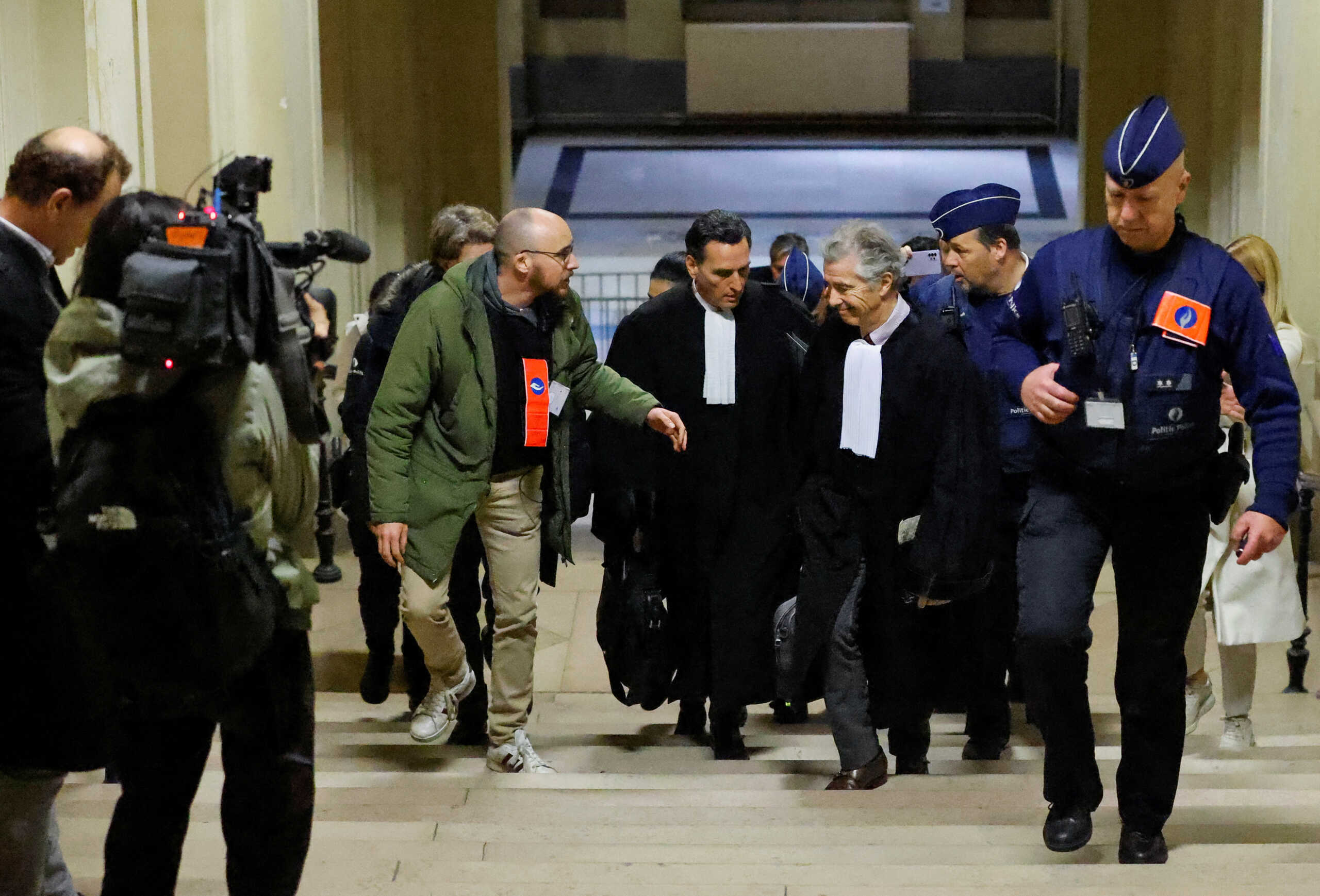 Greek Member of European Parliament Eva Kaili's lawyers Michalis Dimitrakopoulos and Andre Risopoulos walk, on the day Eva Kaili, former vice-president of the European Parliament, appears before magistrates in Brussels, Belgium December 22, 2022. REUTERS