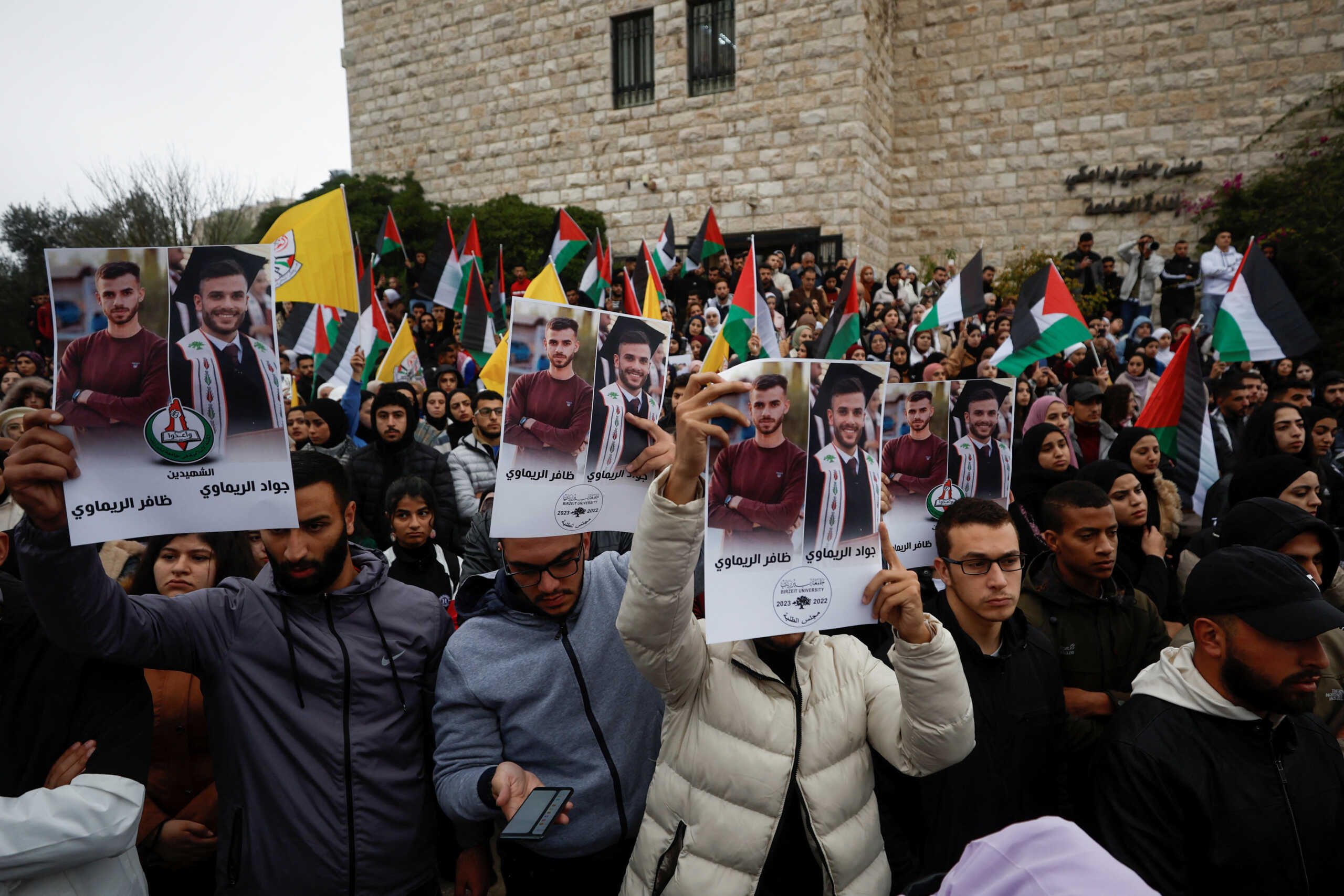 Mourners attend the funeral of two Palestinian brothers Dafer and Jawad Remawi, near Ramallah in the Israeli-occupied West Bank November 29, 2022. REUTERS