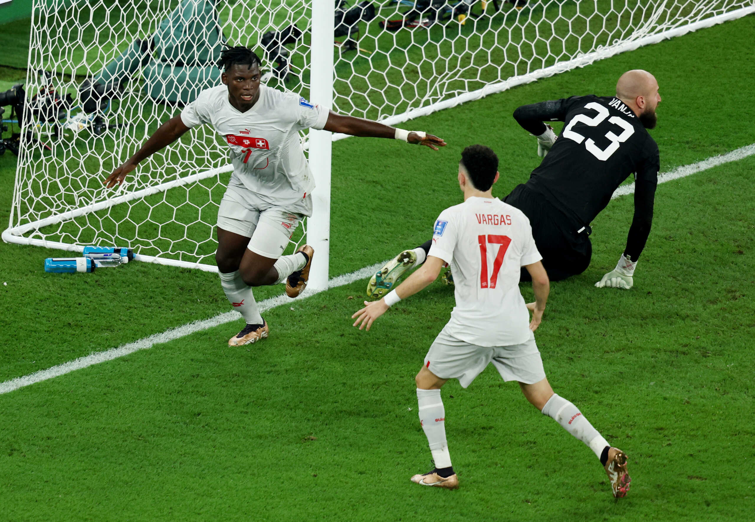 Soccer Football - FIFA World Cup Qatar 2022 - Group G - Serbia v Switzerland - Stadium 974, Doha, Qatar - December 2, 2022 Switzerland's Breel Embolo celebrates scoring their second goal with Ruben Vargas REUTERS