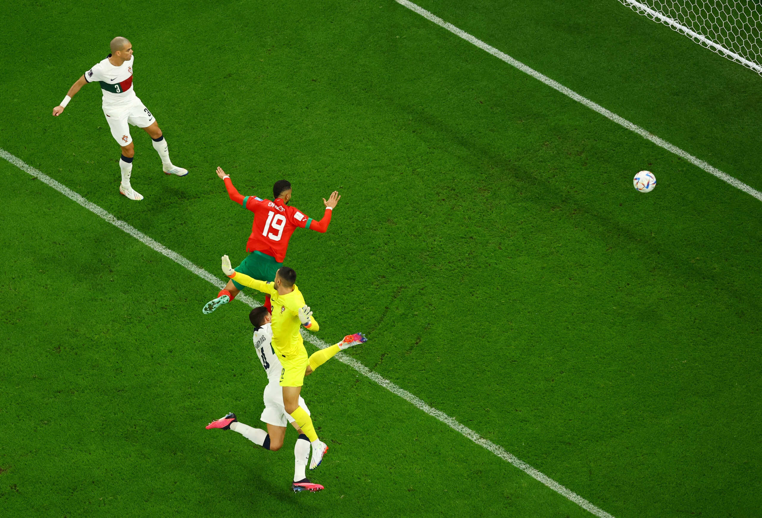 Soccer Football - FIFA World Cup Qatar 2022 - Quarter Final - Morocco v Portugal - Al Thumama Stadium, Doha, Qatar - December 10, 2022 Morocco's Youssef En-Nesyri scores their first goal REUTERS